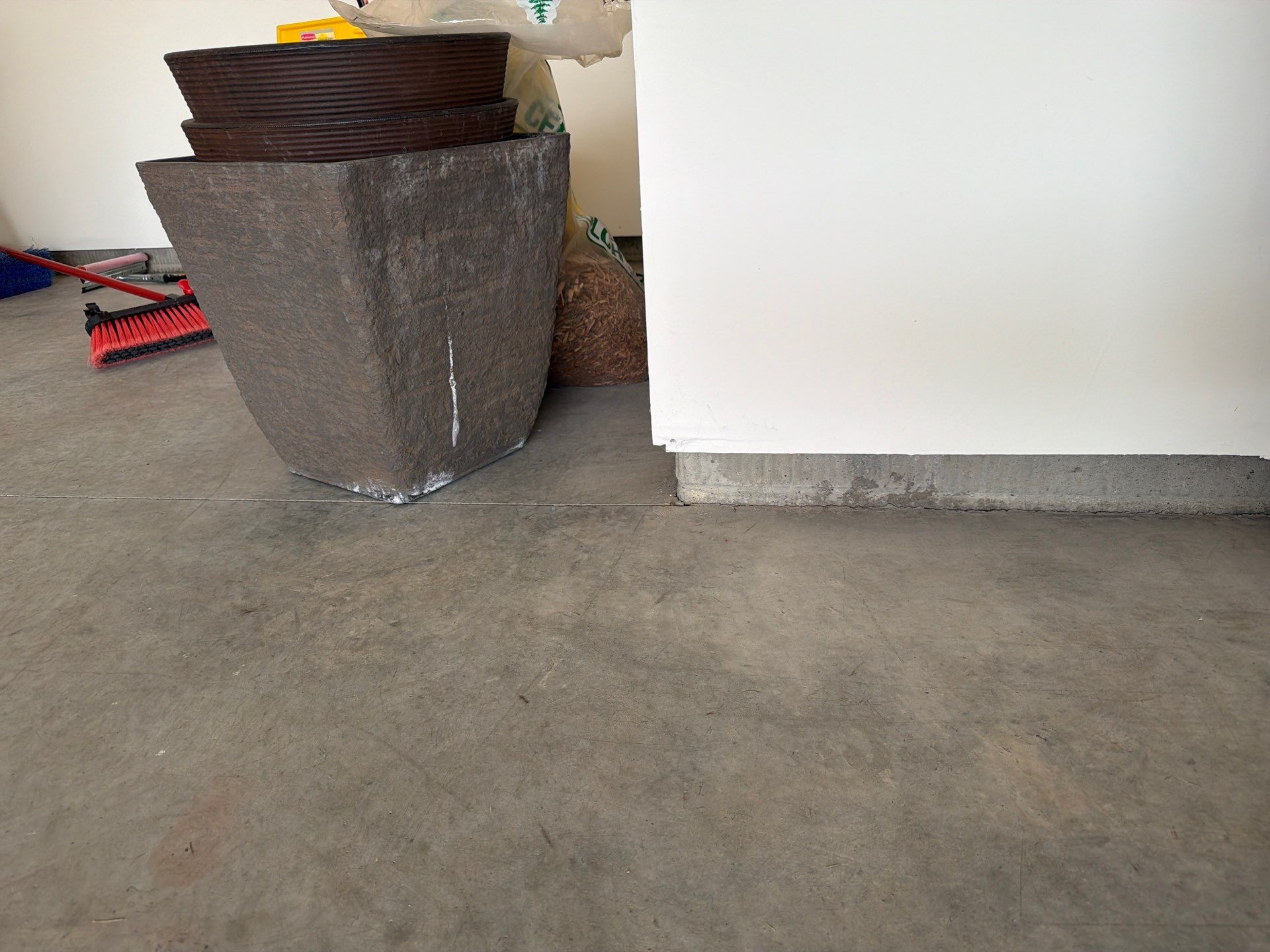 Cabin Fever Garage Floor Coating in Sioux Falls by Select Painting, Coatings & Garage Cabinets