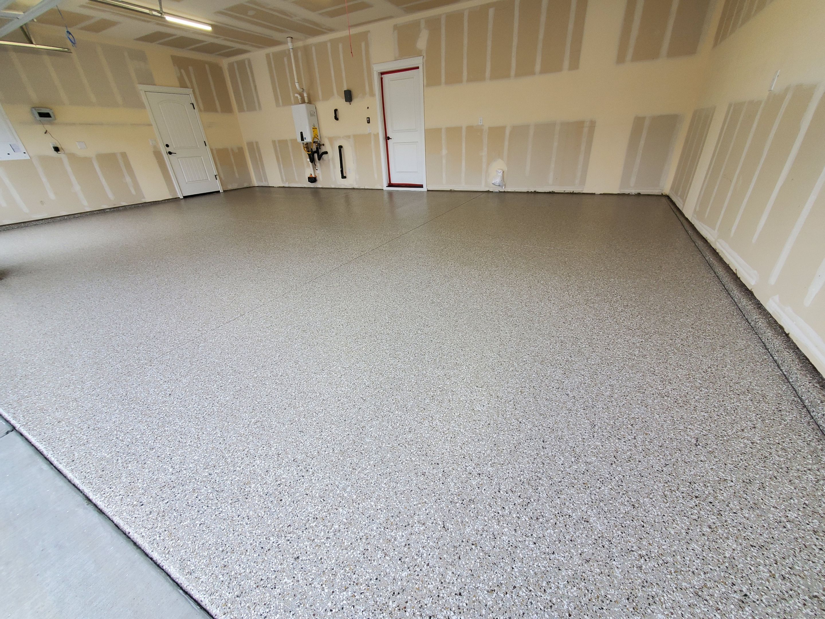 Garage Transformation using Pebble Beach by Croc Coatings, LLC