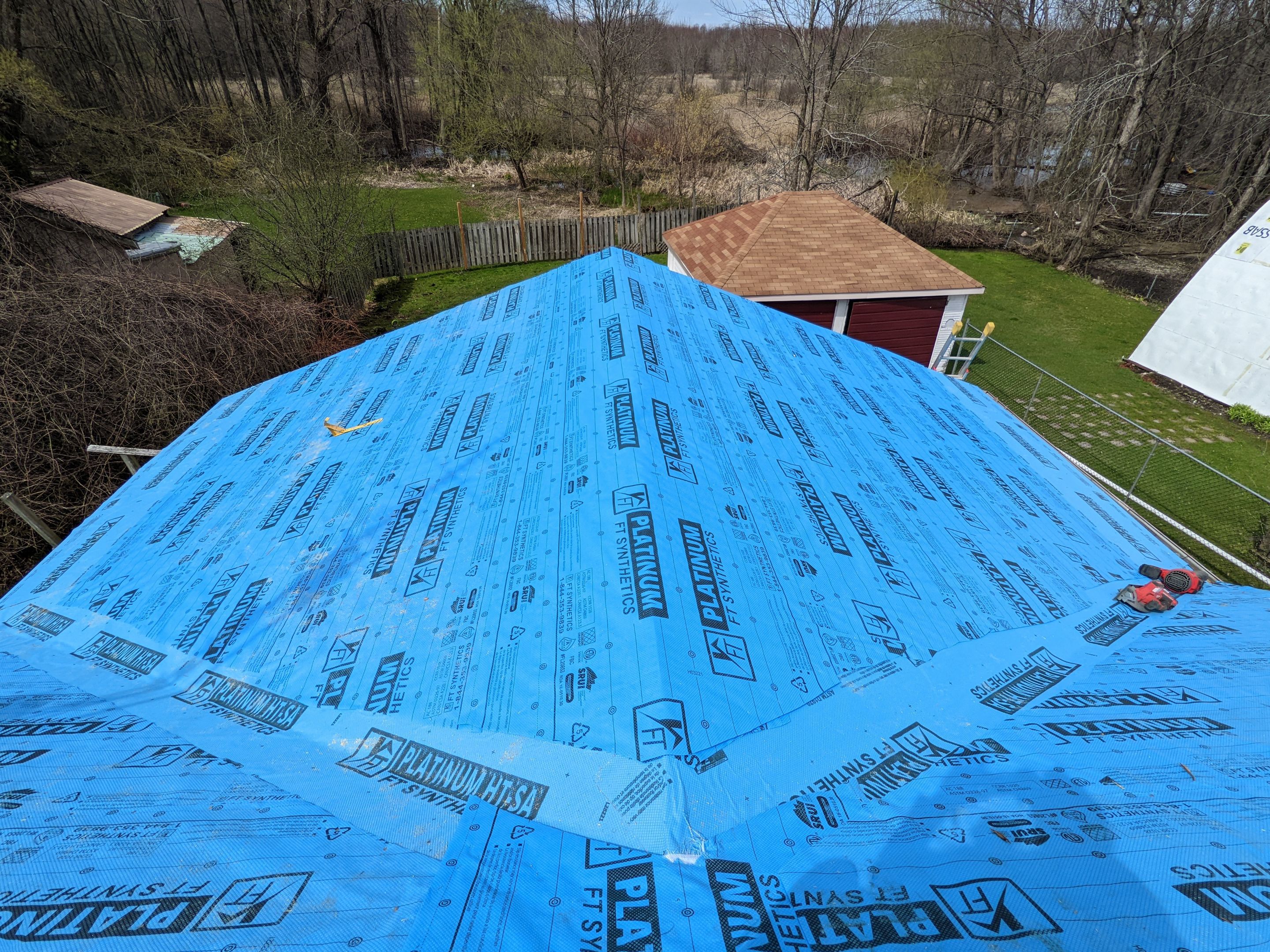 Residential Roofing Installation using 16" Standing Seam Panels by Jay Carter Roofing & Sheet Metal