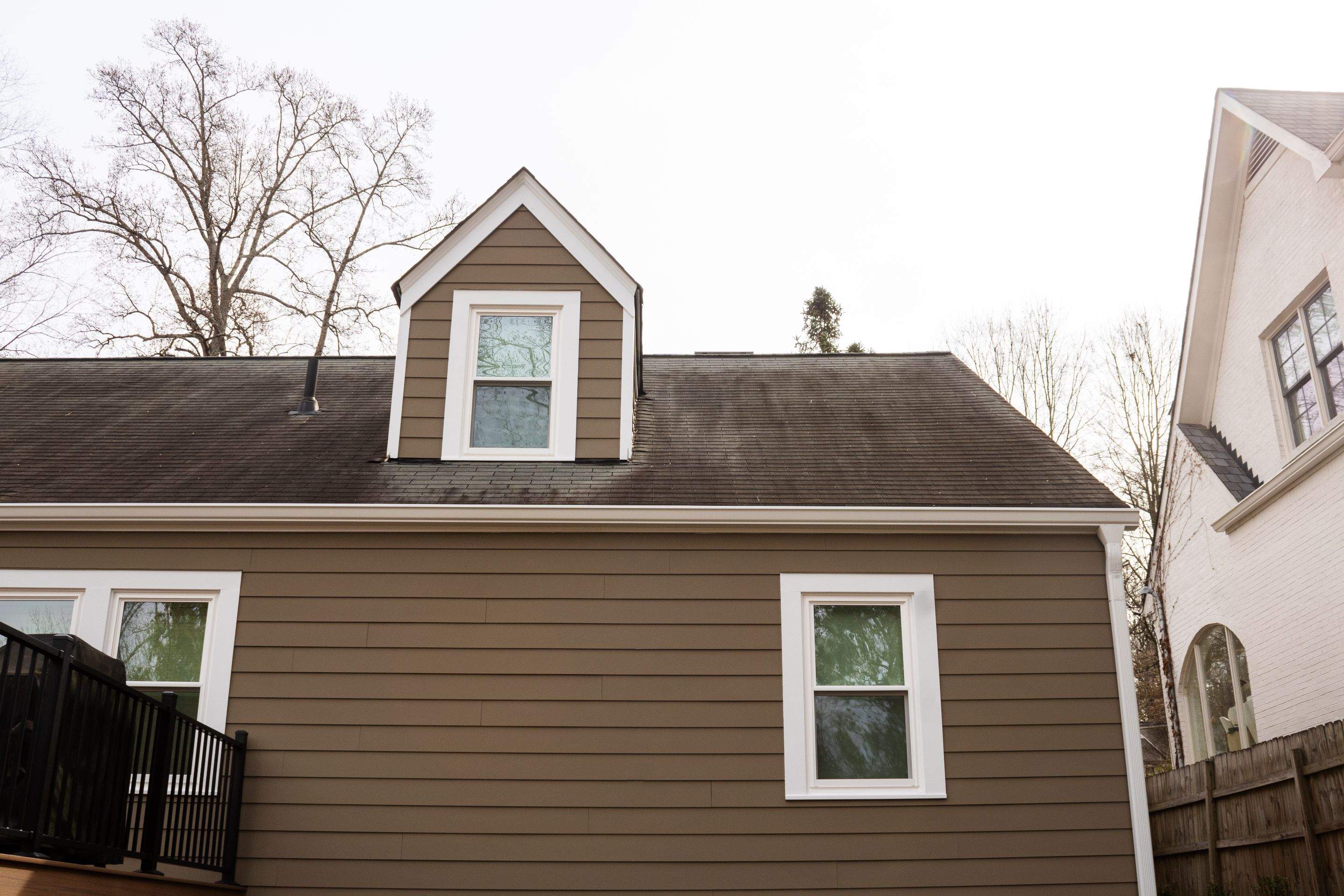 Full Siding Replacement, Deck Build, Exterior Paint, and Gutter Replacement by Nelson Exteriors