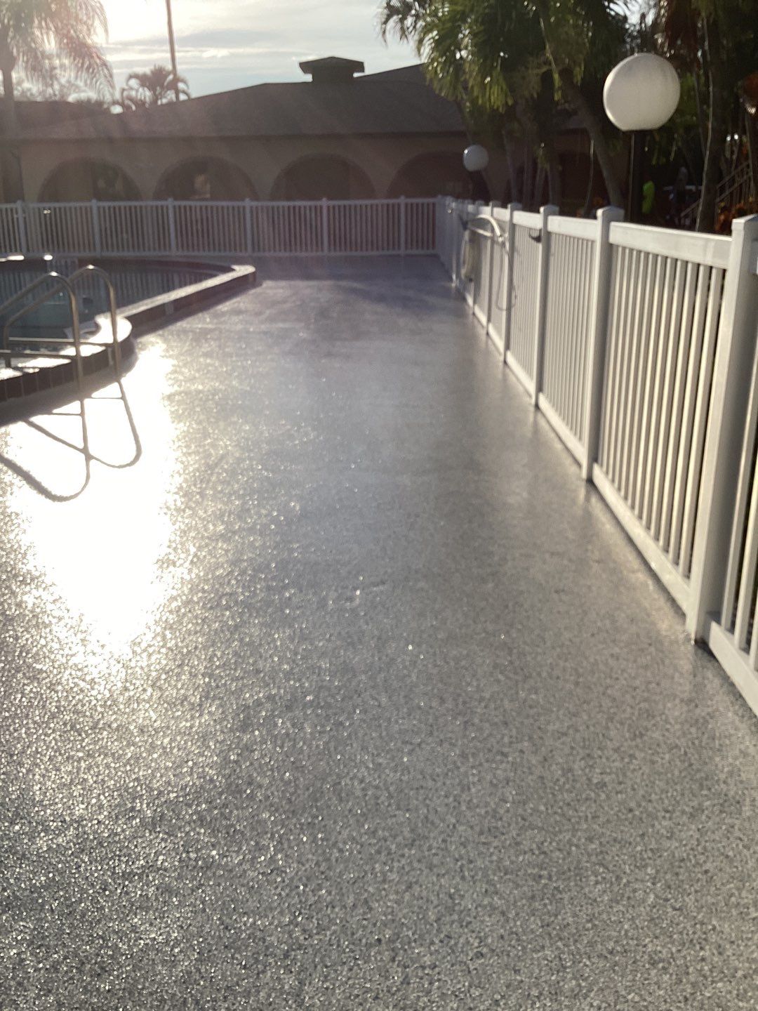 Pool Deck using Orbit and Tidal Wave by Amvet concrete coatings llc