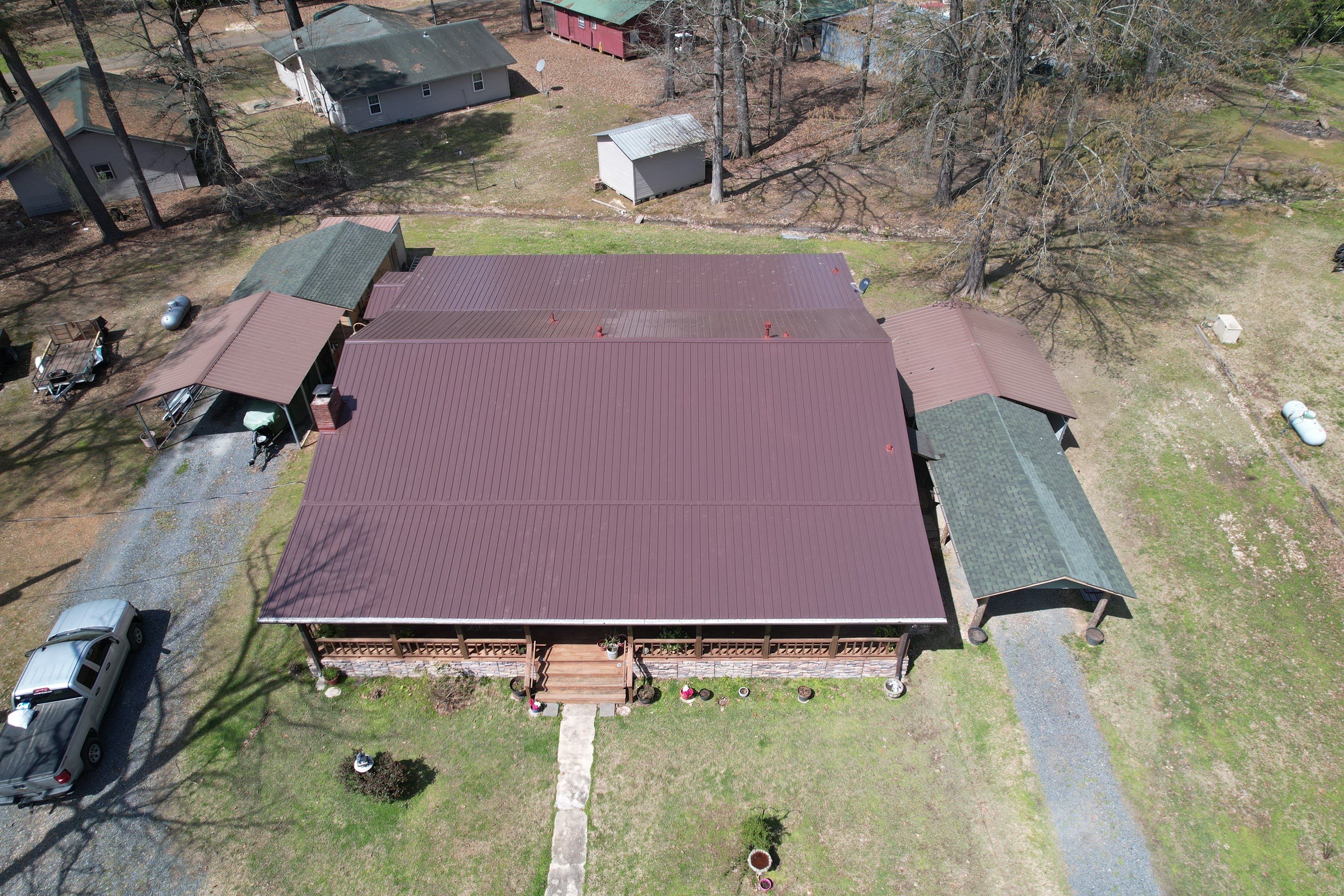 Residential Roofing Installation using 29 Gauge Colored Metal by Hostetler Roofing
