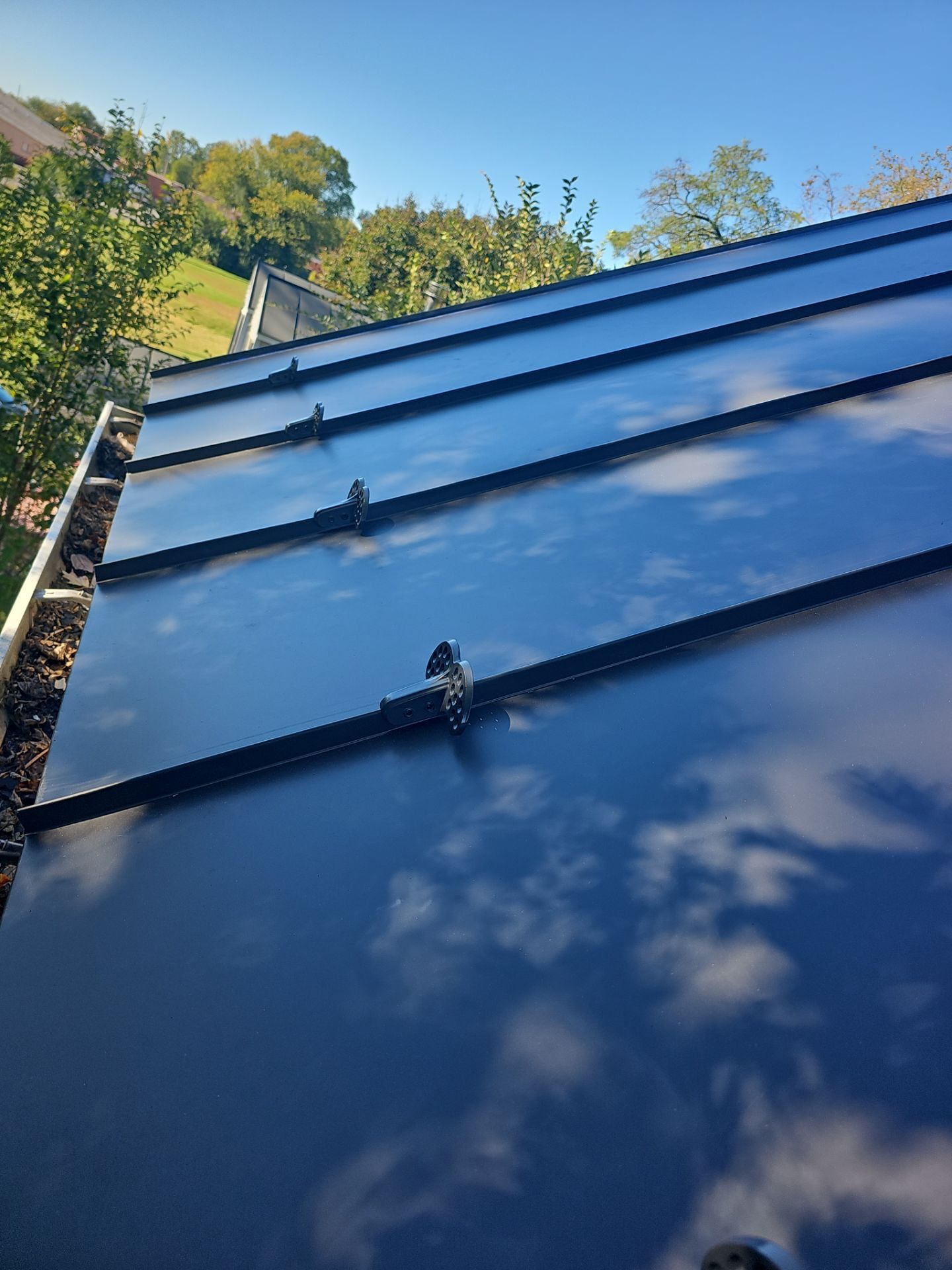 Metal Roof and Gutter Replacement by Winchester Roofing