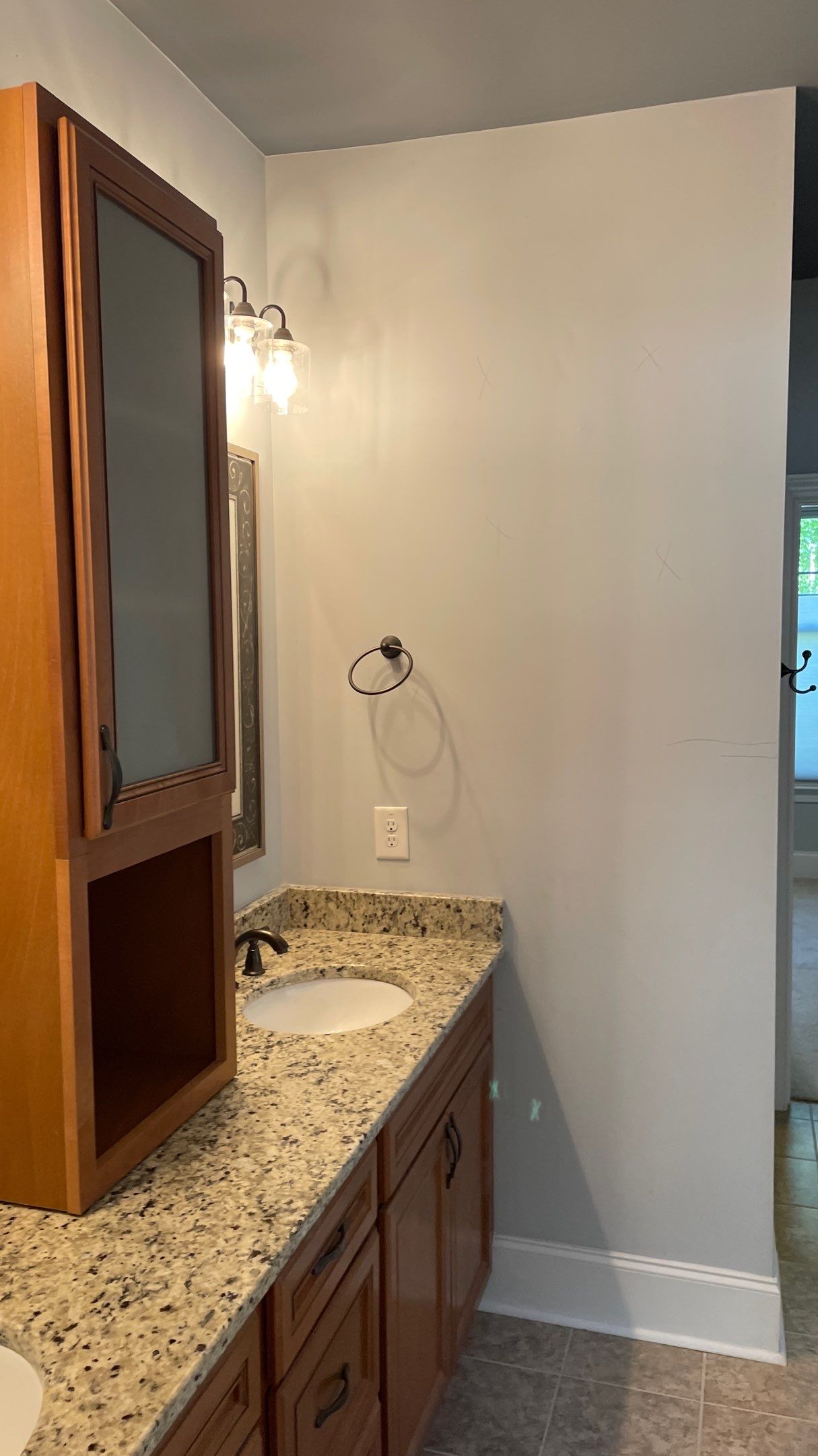 Bright Bathroom Remodel with Wall Removal, Stand Alone Tub and New Vanity by Footprints Floors of Coastal Carolina