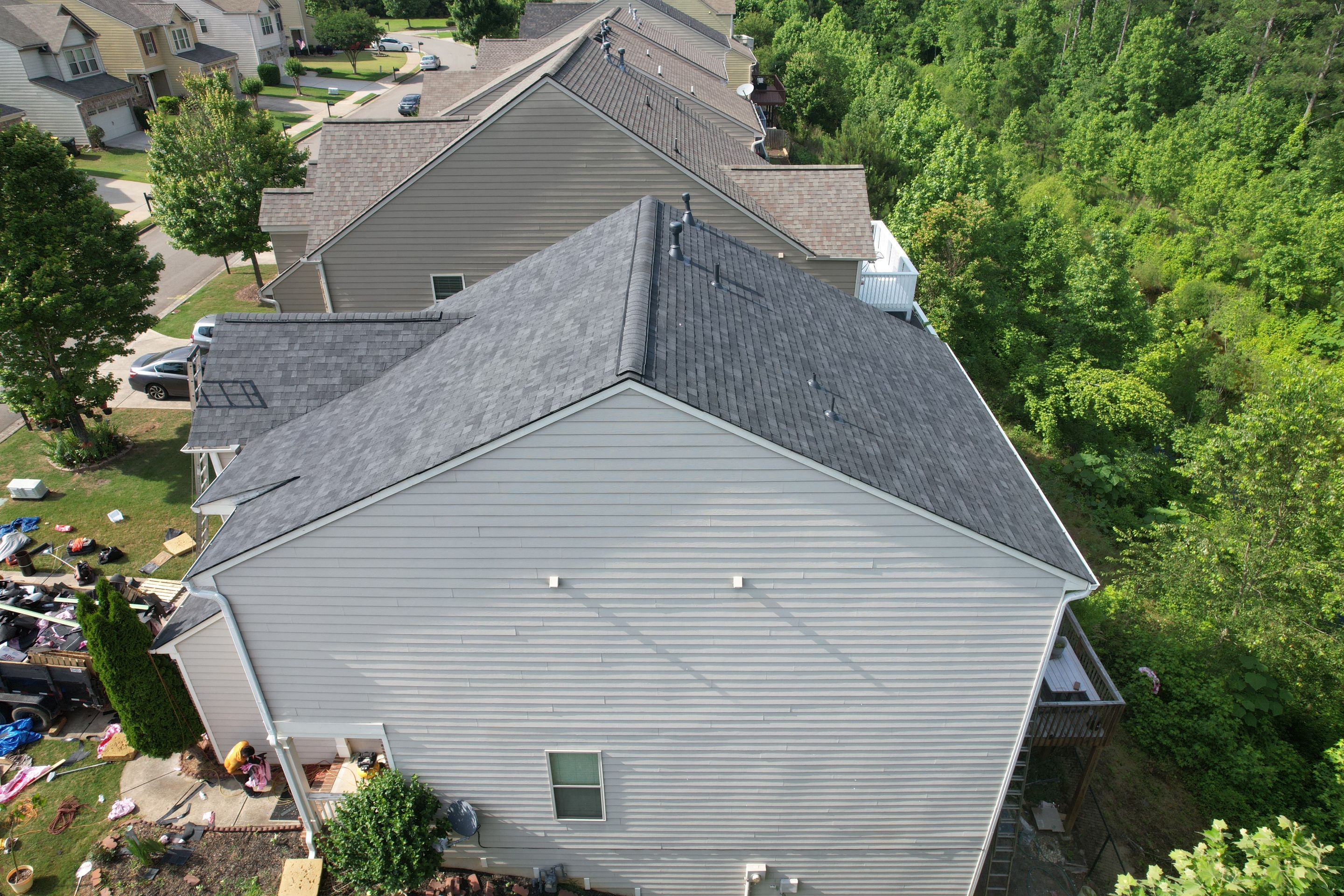 Residential Roof Replacement using Owens Corning Trudef Twilight Black by Inspector Roofing and Restoration