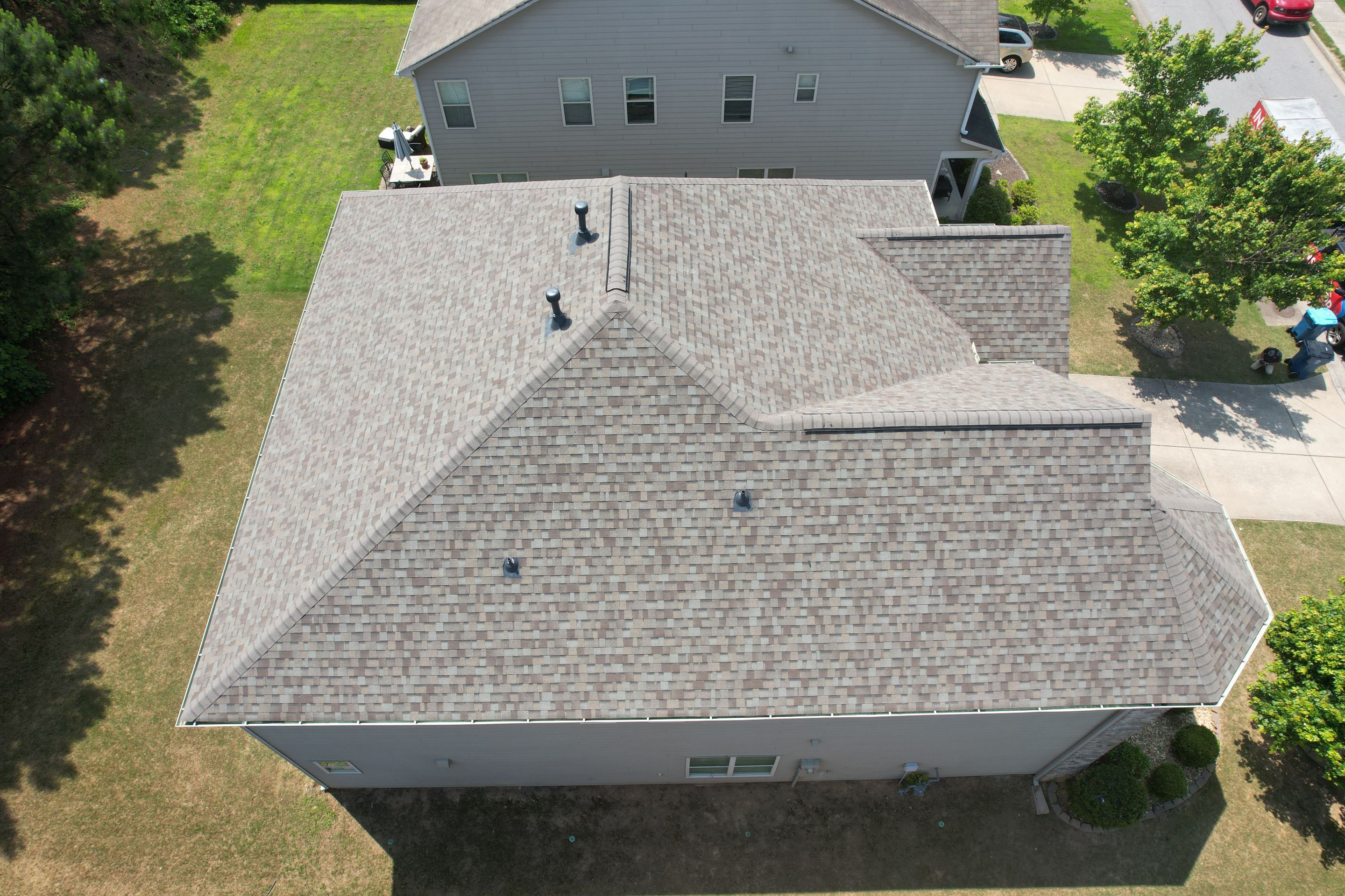 Residential Roof Replacement using Owens Corning TruDef Driftwood by Inspector Roofing and Restoration