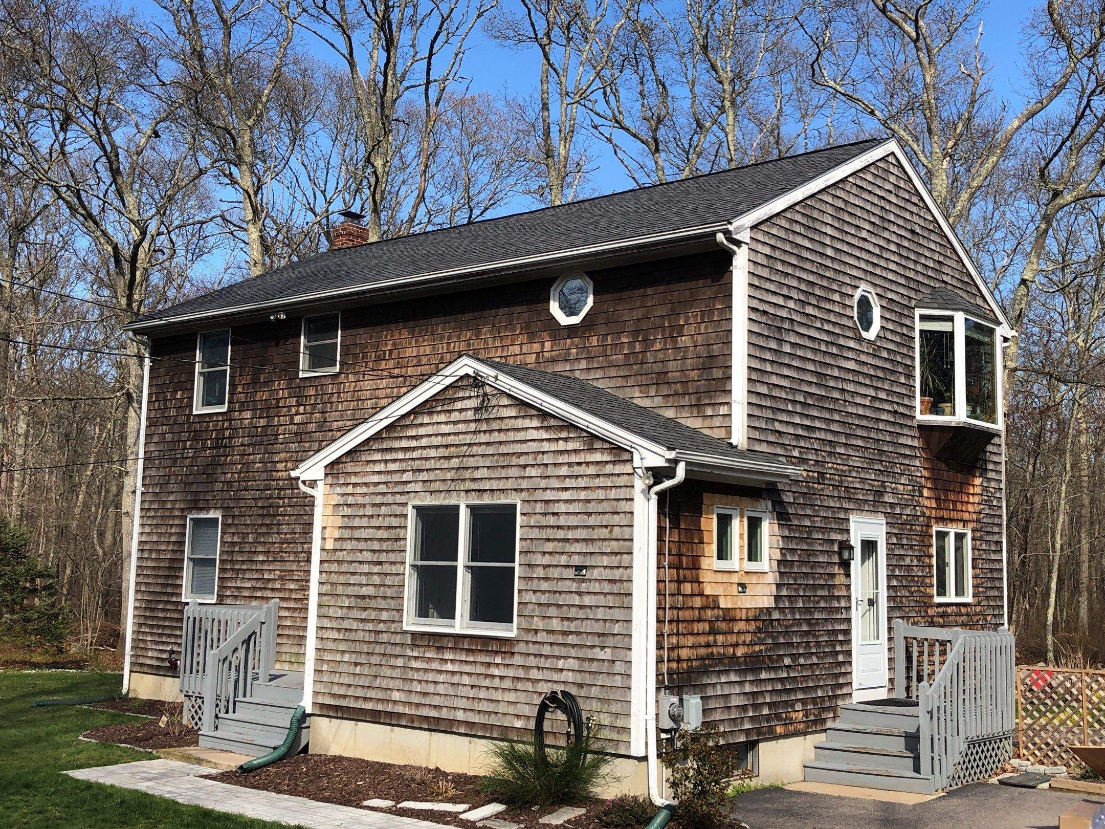 Pewterwood Roofs by Pinnacle Roofing & Skylights