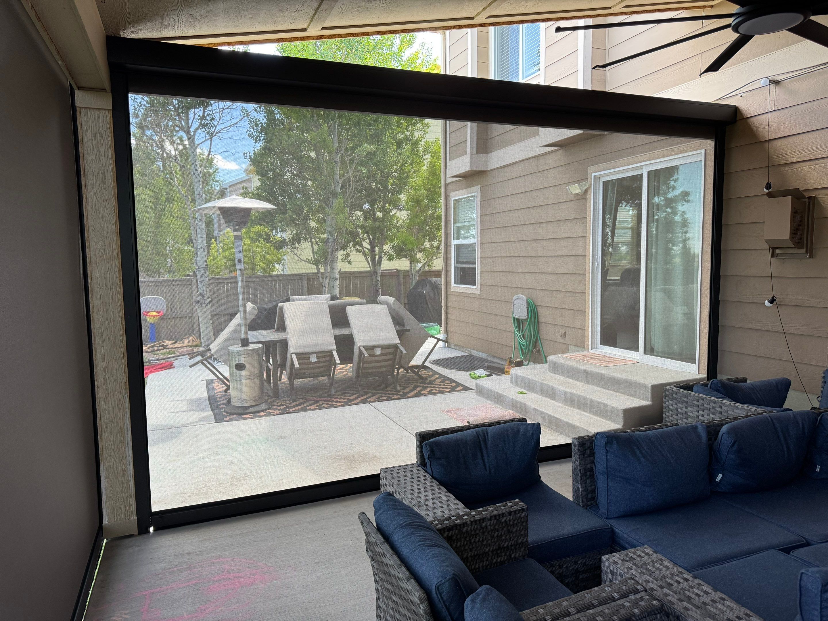 Motorized MagnaTrack Privacy Screen Installation on Castle Rock Patio by Outdoor Solutions Colorado
