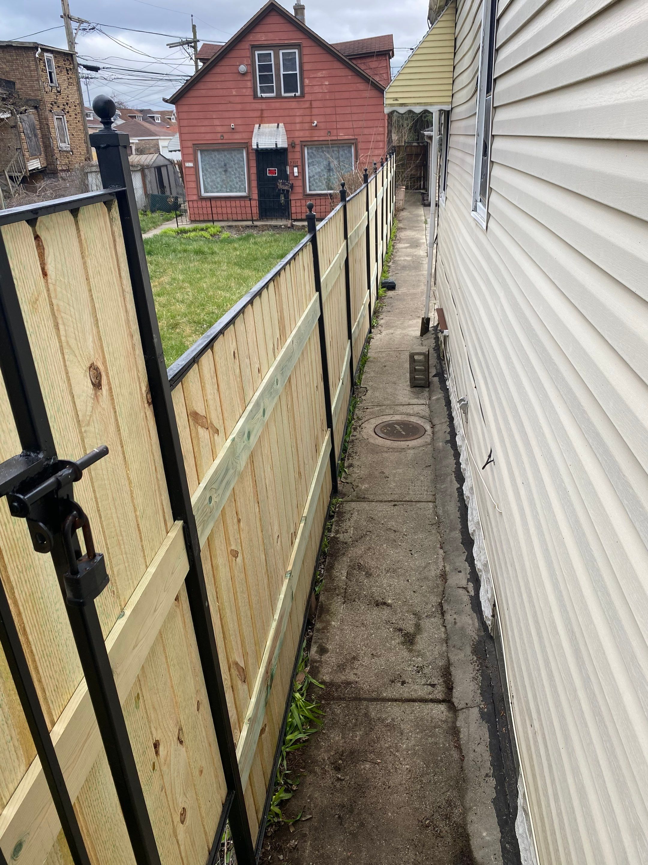 Fence Installation using pressure treated lumber  by INQUSE GENERAL CONTRACTOR