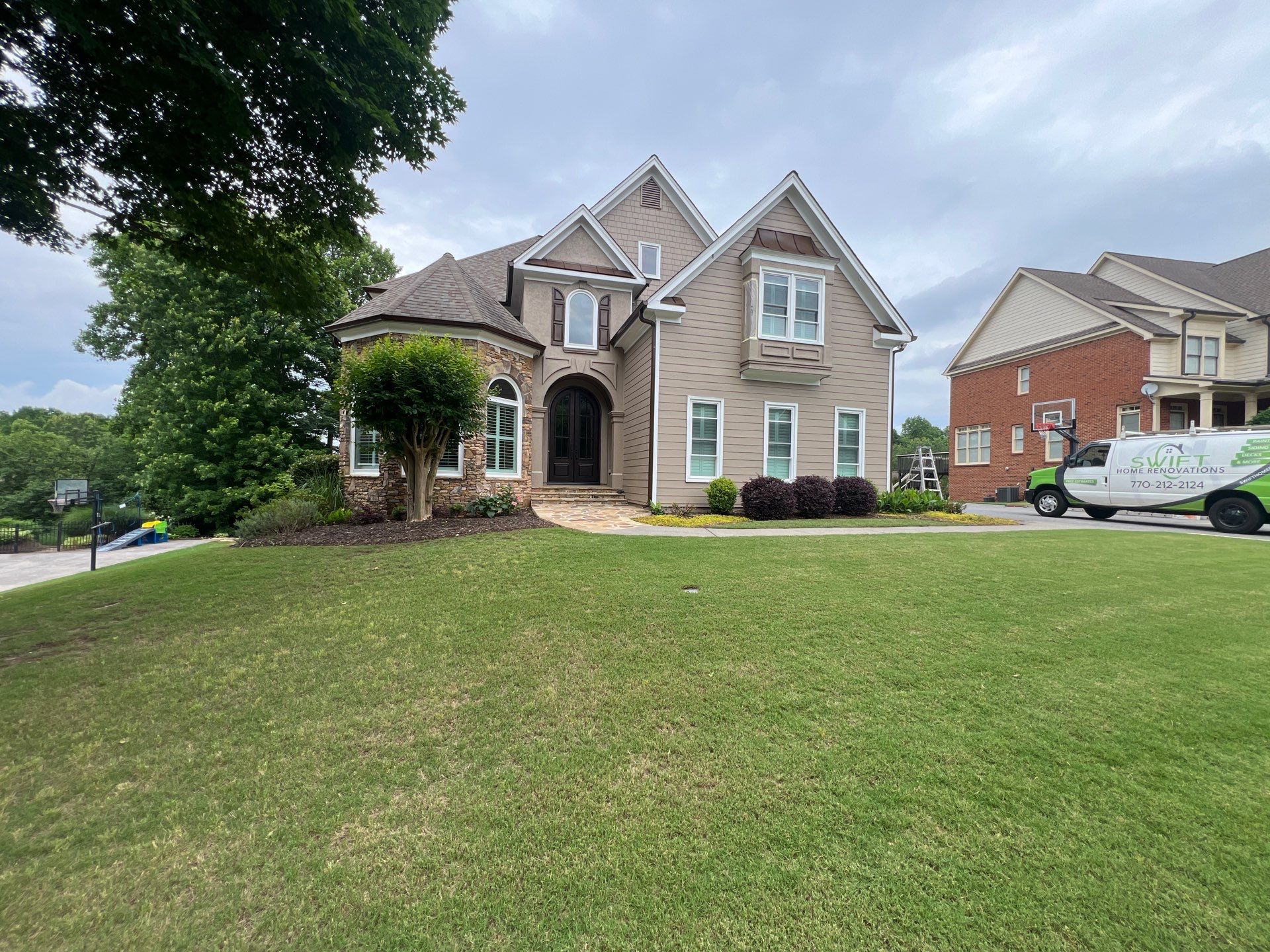 Full Exterior Siding Replacement and Stone Veneer Installation in Roswell by Swift Home Renovations