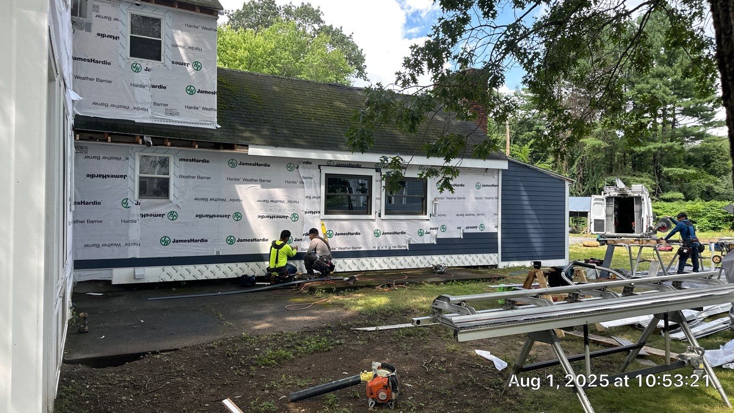 James Hardie Lap Siding Installation in Chelmsford, MA by Mighty Dog Roofing of Greater Middlesex County