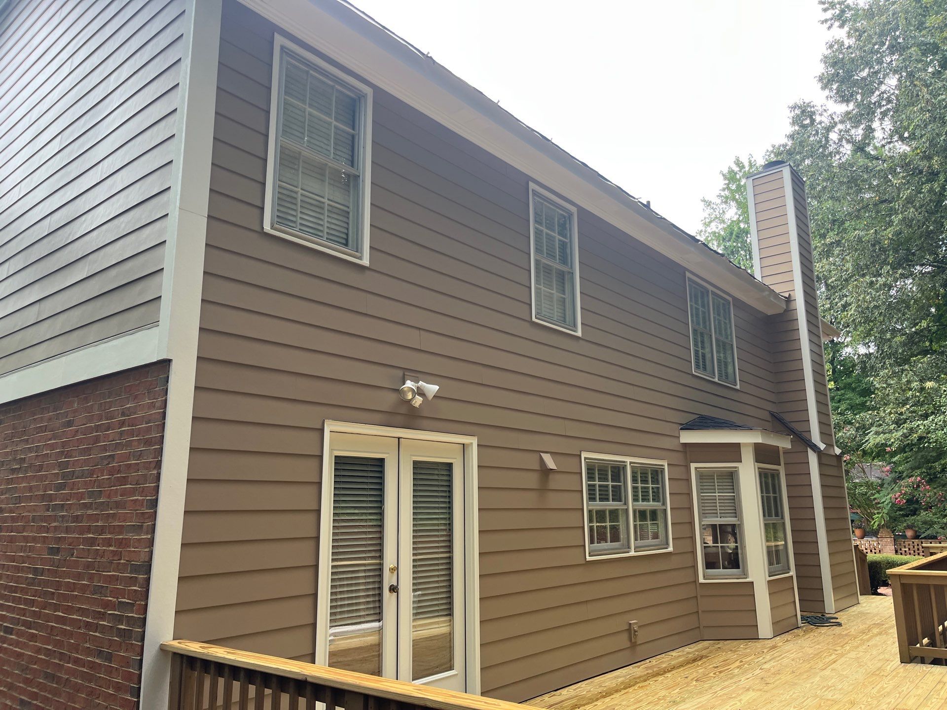 James Hardie Siding Installation, Rotten Wood Replacement, Porch Repairs, and Deck Resurfacing in Smyrna, GA by Nelson Exteriors 