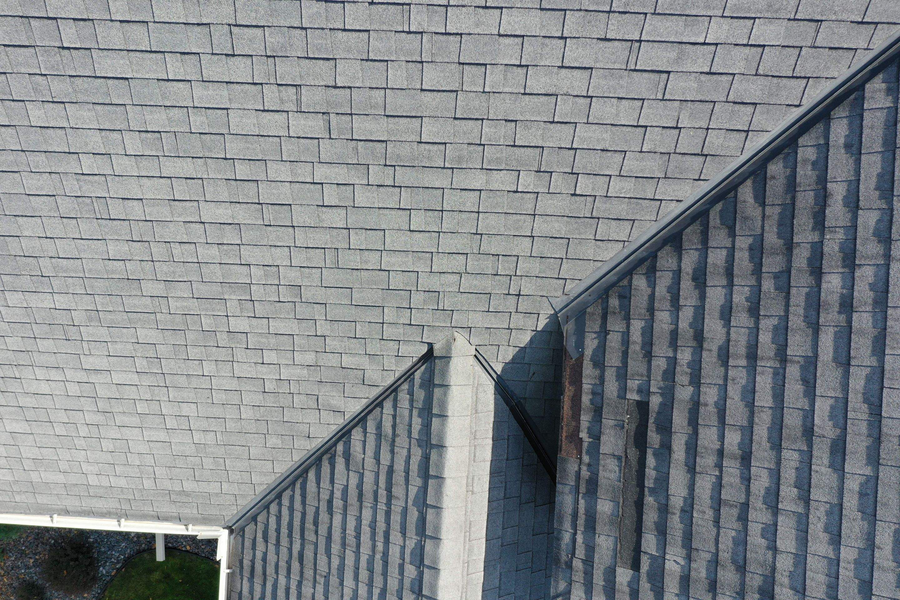 Residential Roofing Installation using Certainteed Landmark Moire Black by MODERN EXTERIOR SYSTEMS