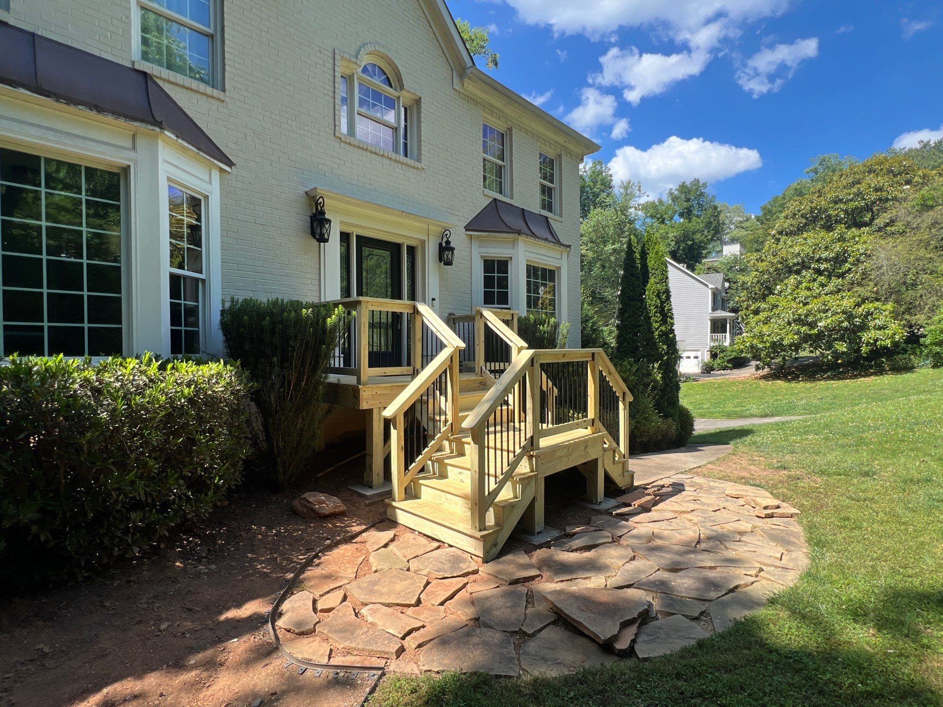 Custom Natural Wood Entryway Deck Replacement in Acworth, Georgia by Swift Home Renovations