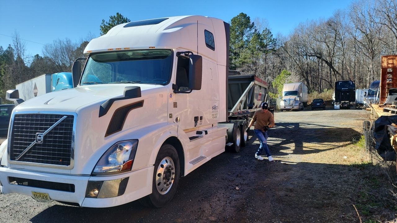semi-truck clean using cleaner by Power Wash Masters LLC