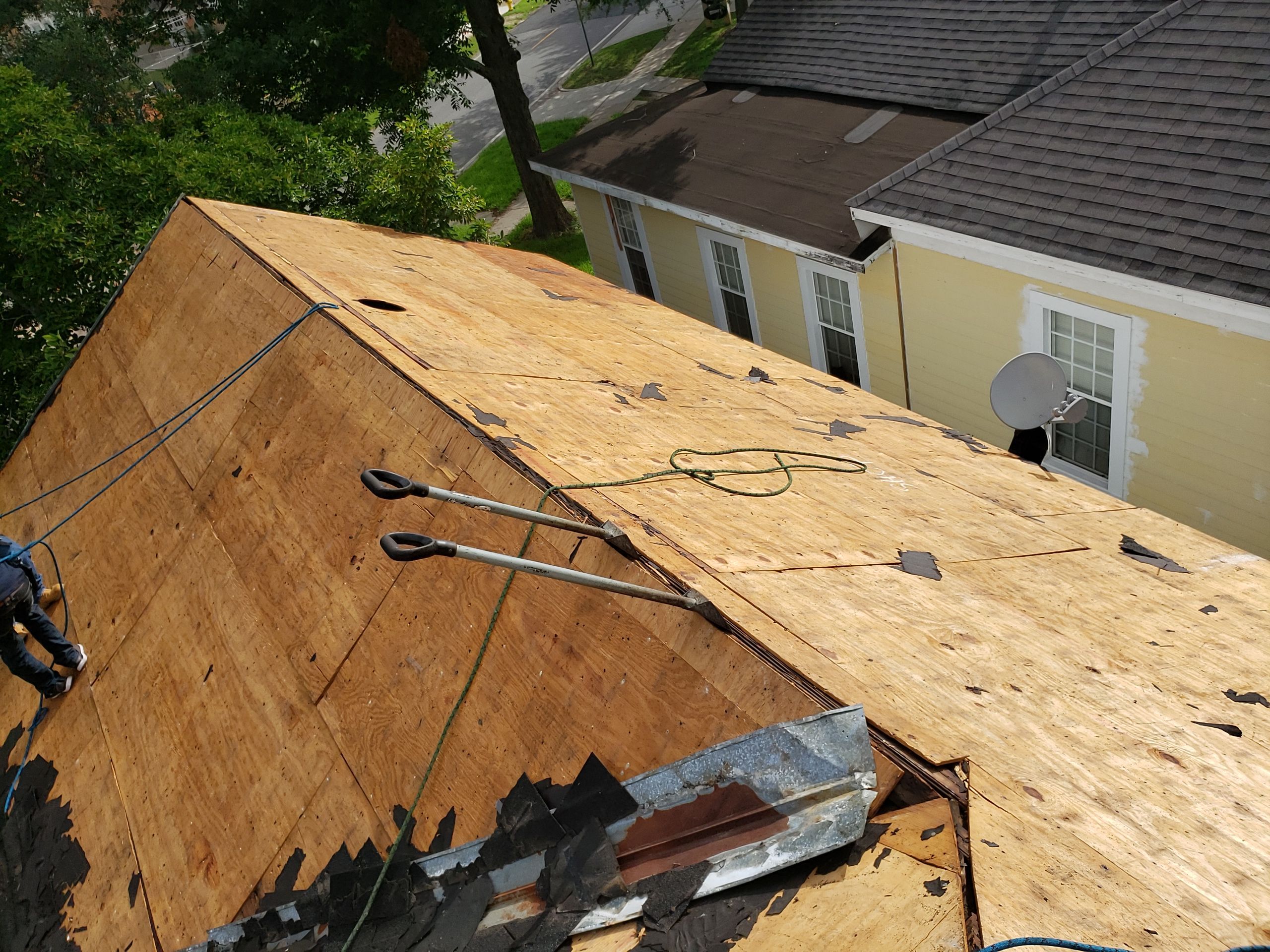Residential Roofing Installation using Roof Replacement by American Roofing & Construction LLC