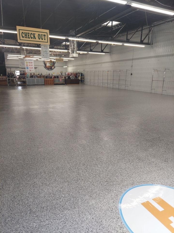 Interior Concrete Coating with Domino & Inlay by Copperhead Coatings