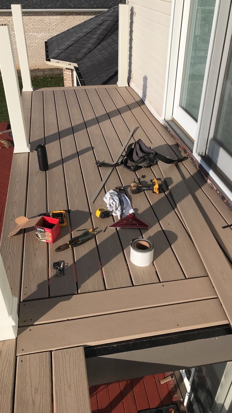 Deck Refurbush and Door Replacement using Trex Decking and Railing. Polaris Patio Doors by Secure Construction Company Inc