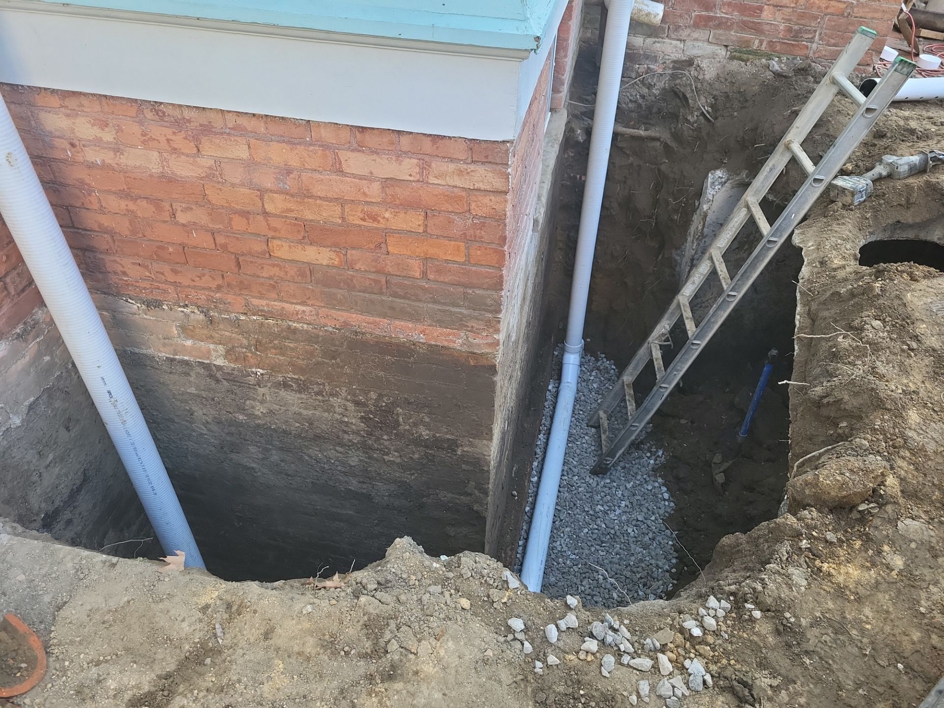 Exterior Basement Waterproofing & Combo Sump Backup System by Toledo Basement Repair
