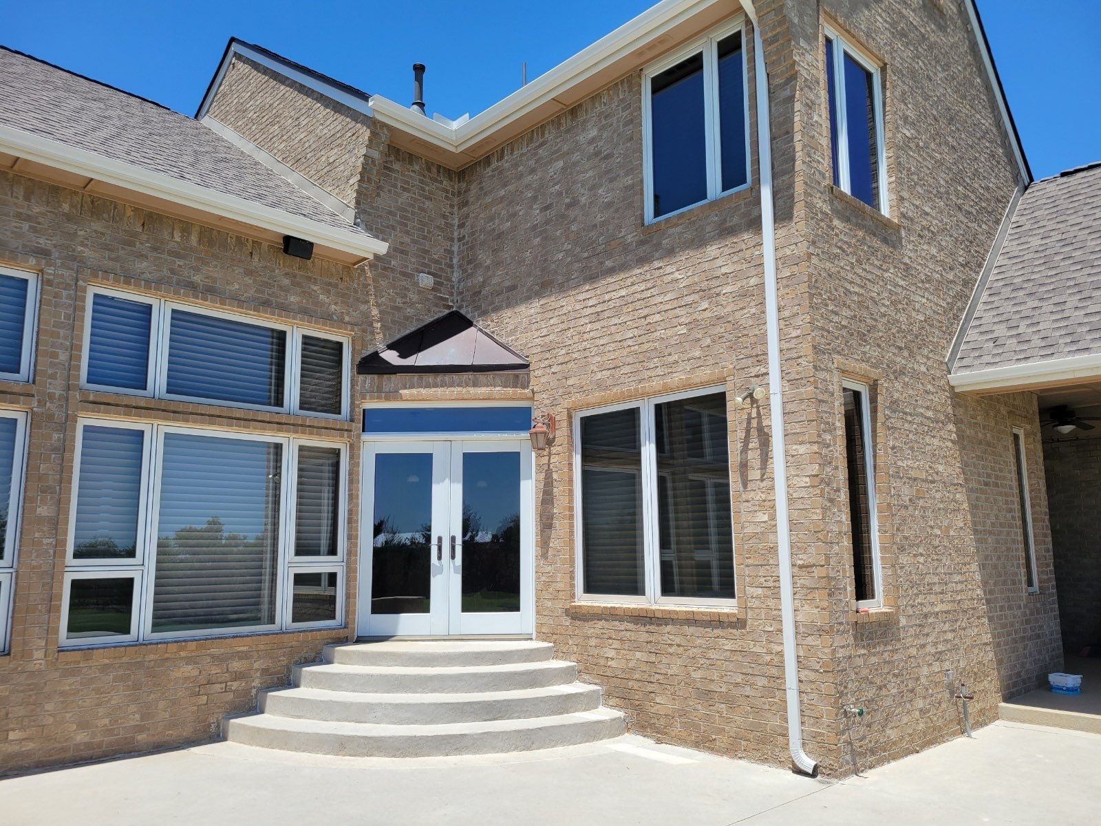 Roof Replacement and Gutter Installation in Edmond, OK by McCann's Roofing and Construction