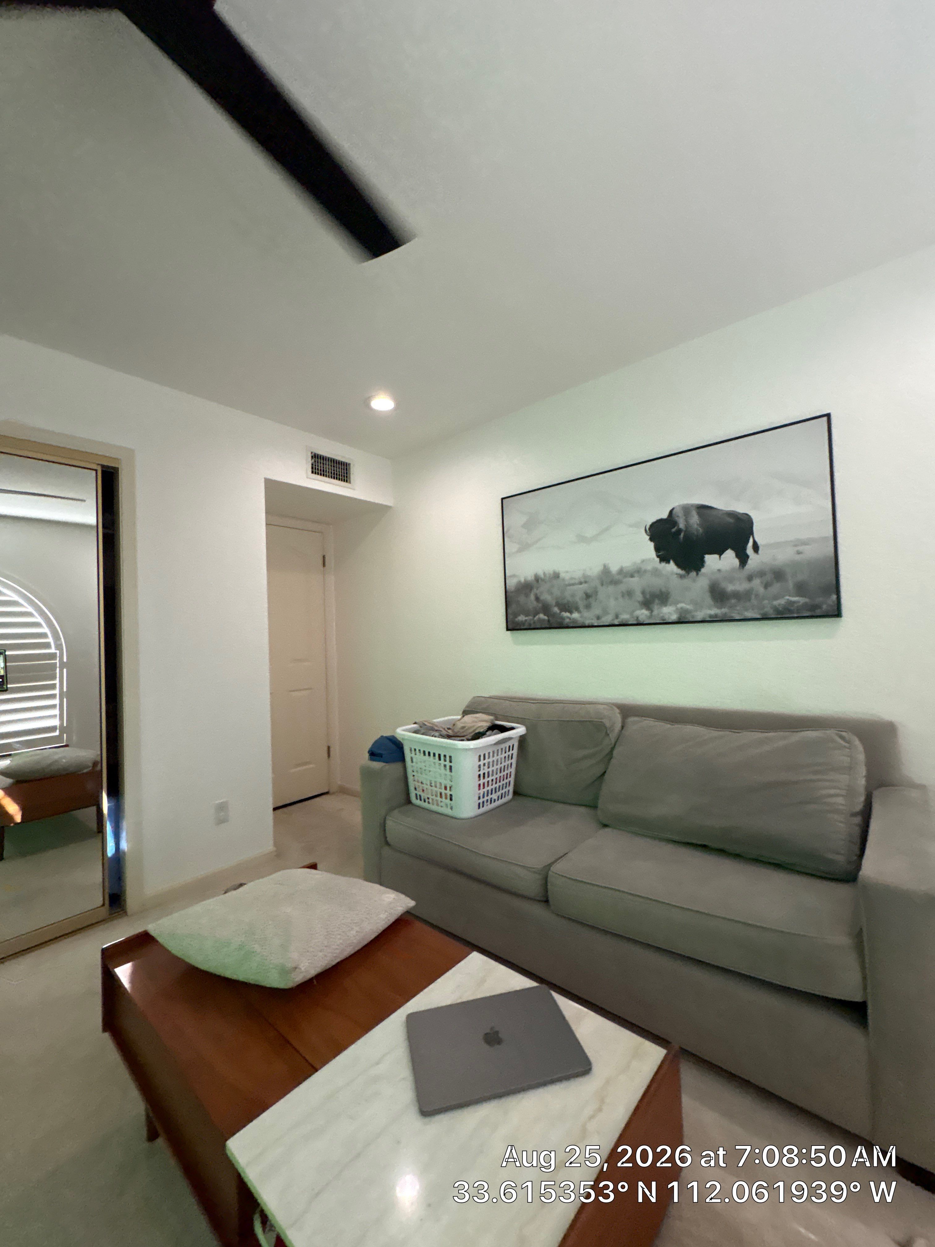 Modern Office Renovation With Arched Shutters and Mirrored Closets by CompanyCam Sales Demo