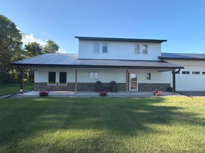 Black Seamless Gutter Installation for barndominium in Buffalo by Next Level Seamless Gutters / Exteriors Inc.
