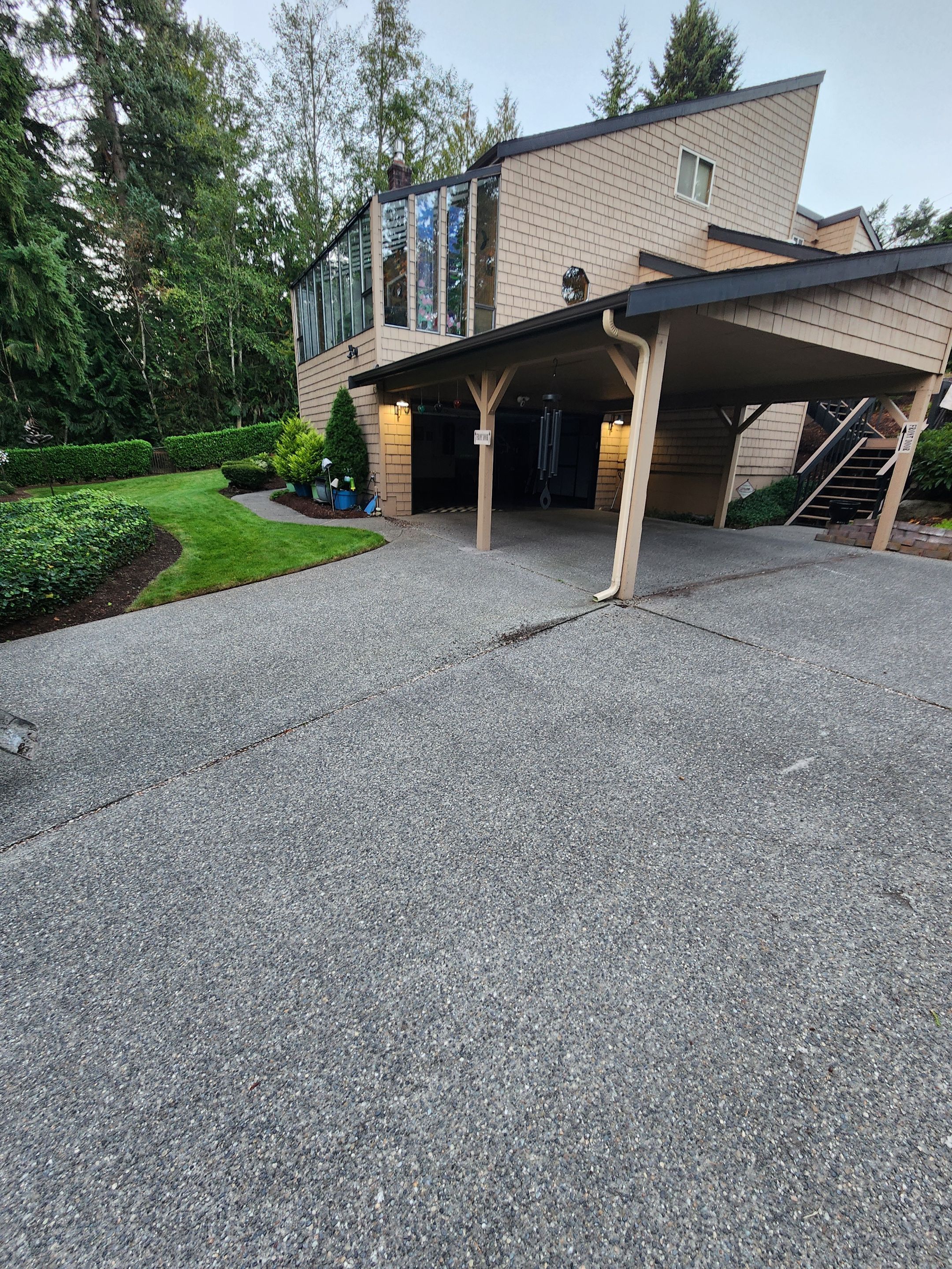 Walkway and driveway by Concrete Coating Experts Inc.