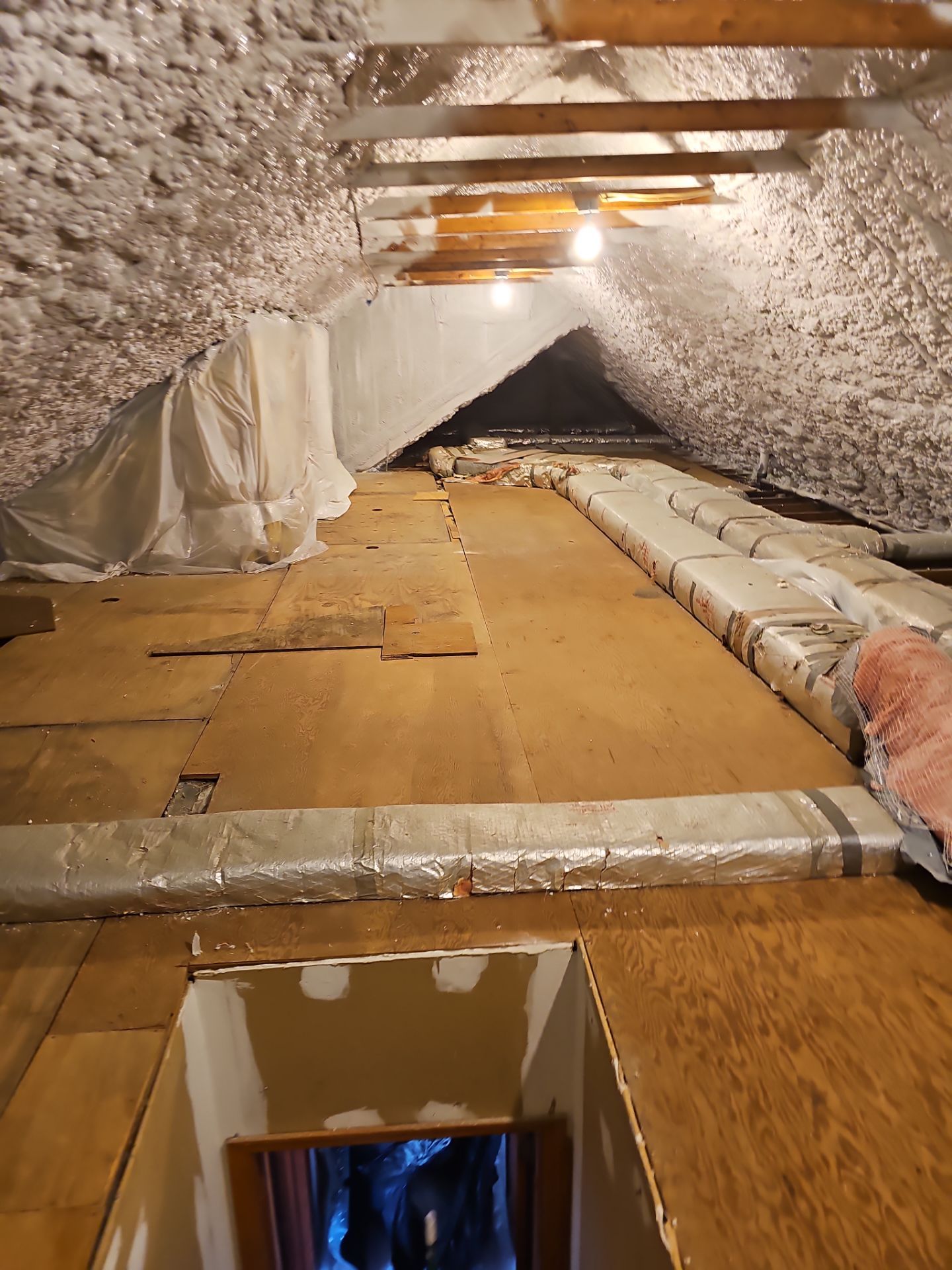 Attic Retrofit using open cell spray foam by NYS Foam & Energy
