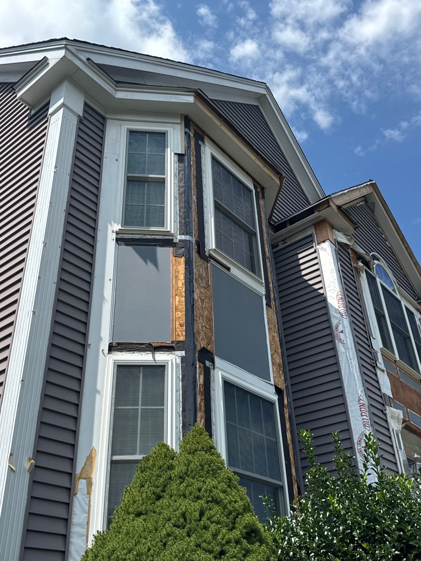 Roof, Trim, Deck, and Gutter Restoration by Mighty Dog Roofing of Greater Middlesex County