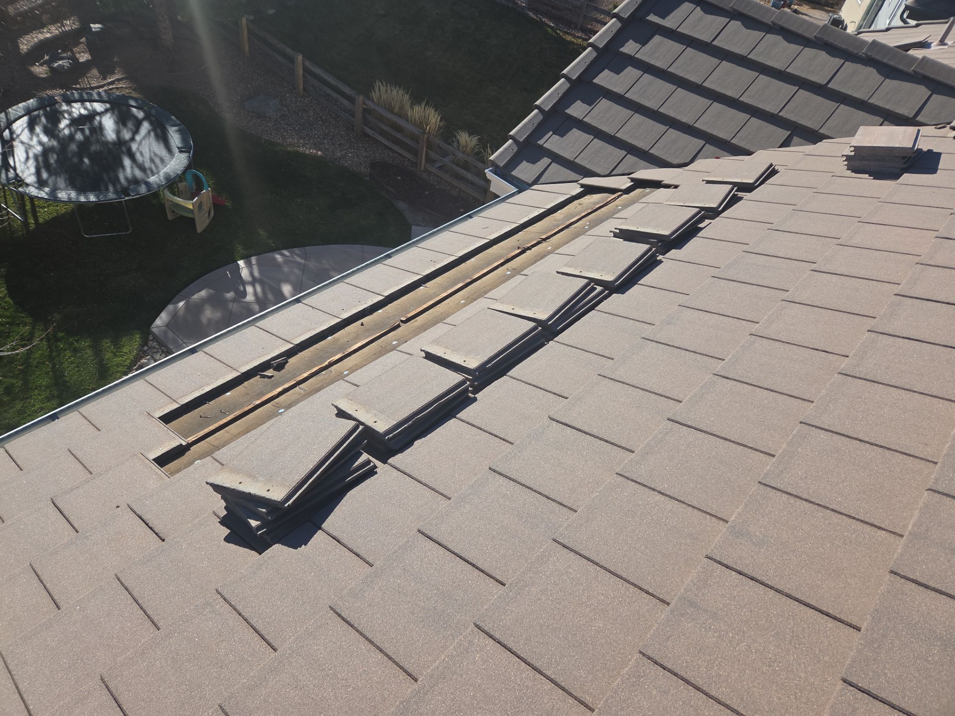 Cracked Tile Replacement by RTP Roofing Company