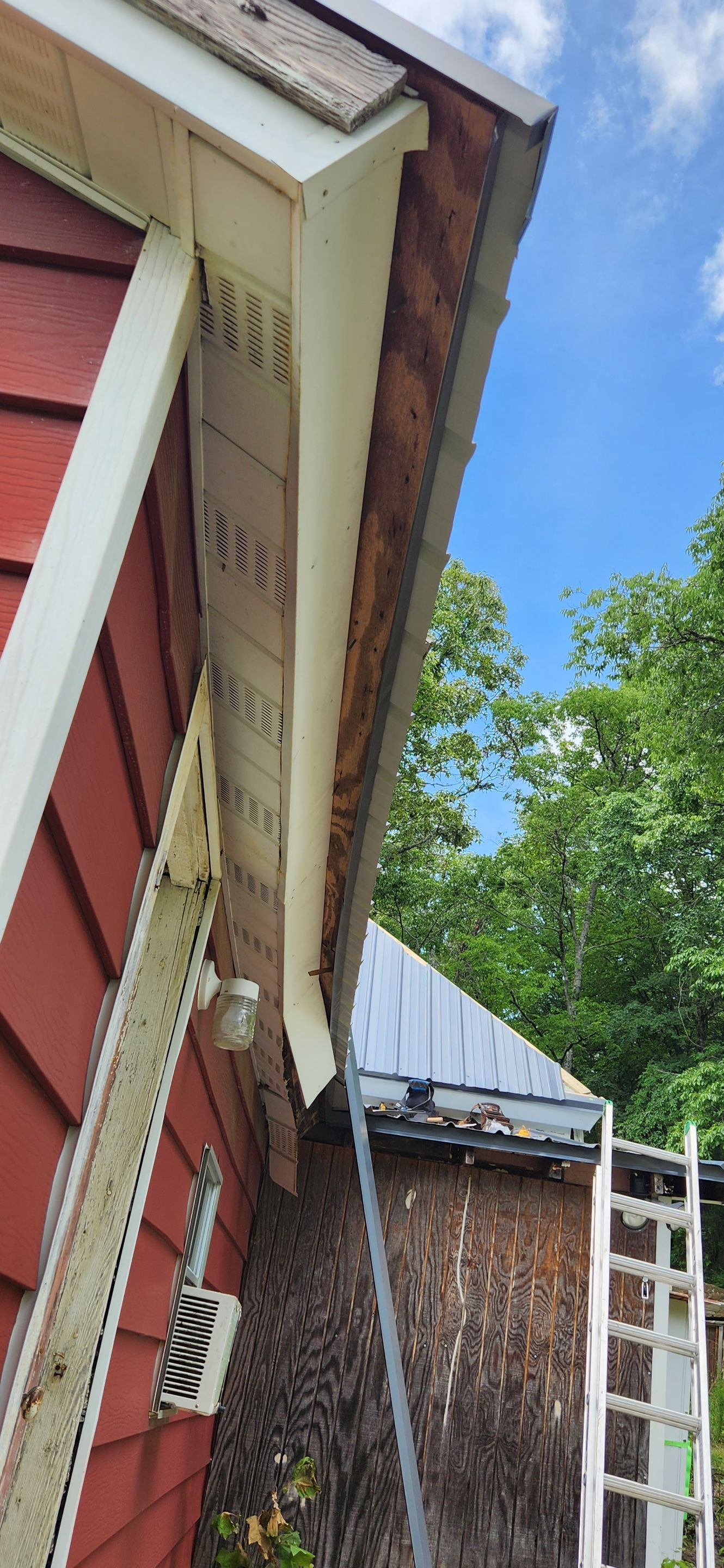Residential Roofing Installation using 26 Gauge Colored Panels by Hostetler Roofing