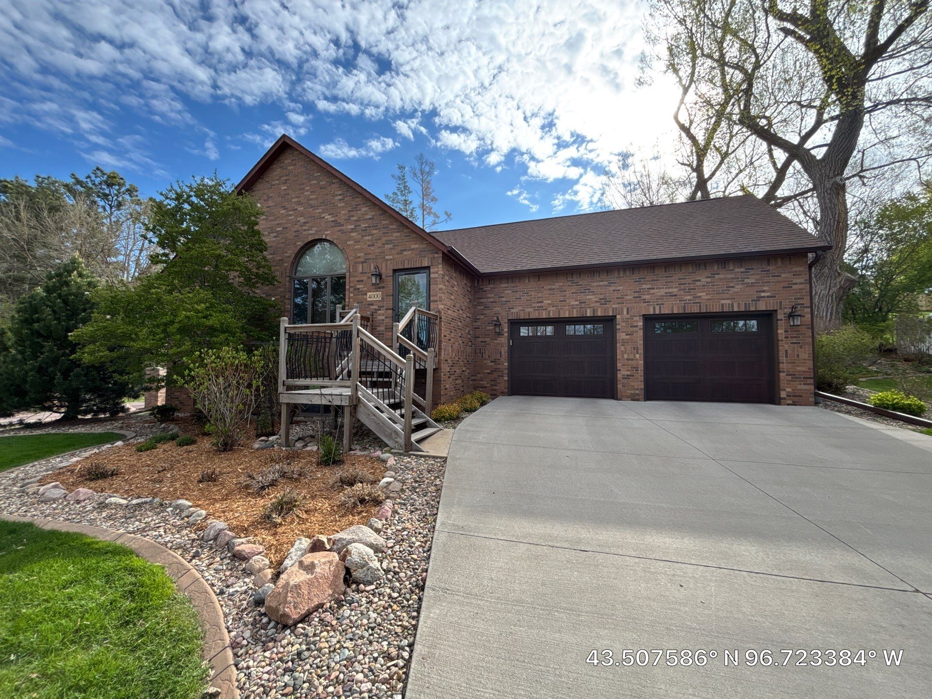 Sioux Falls Exterior Painting and Solid Color Deck Staining by Select Painting, Coatings & Garage Cabinets