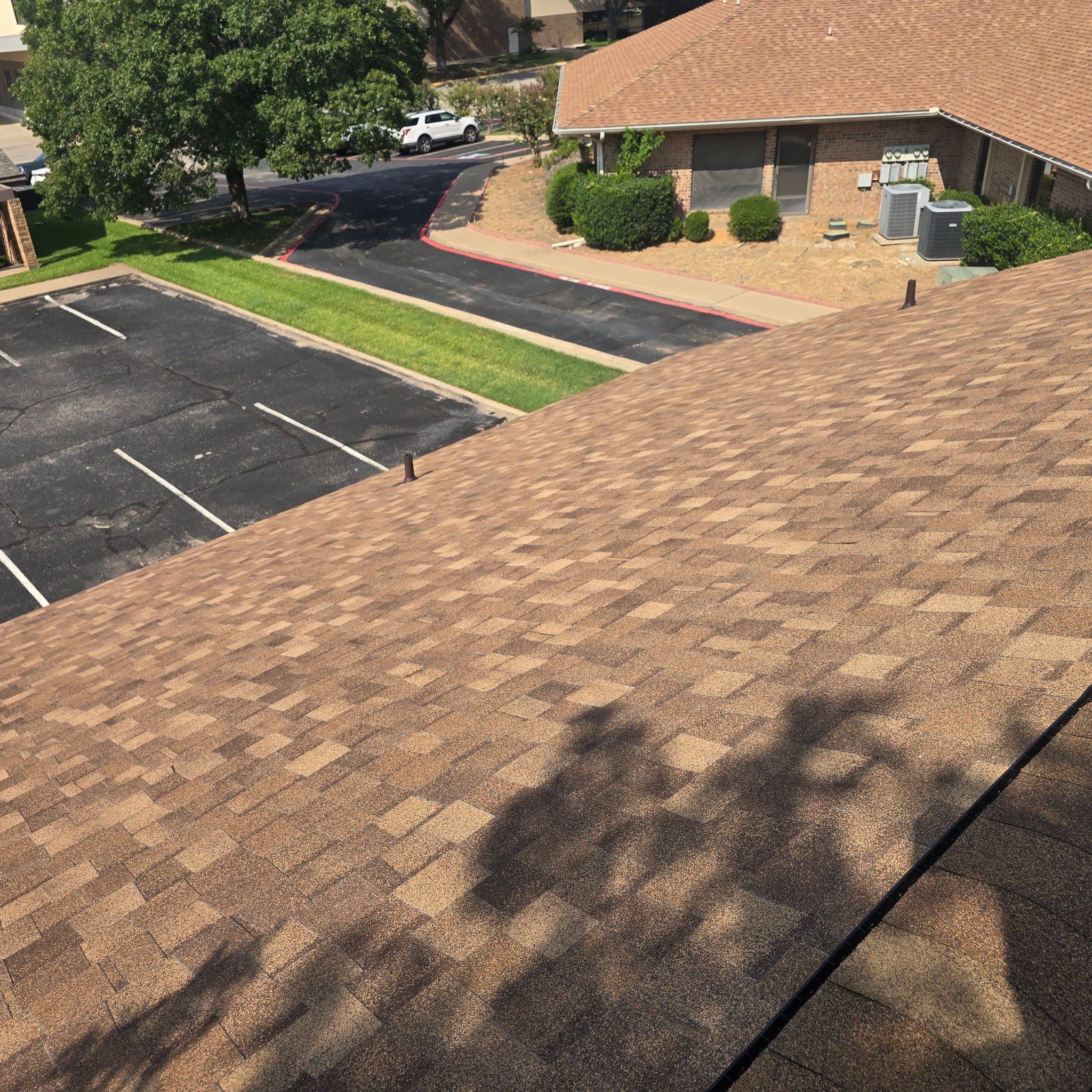 Commercial Roof Replacement using ATLAS StormMaster Shake by Harvey Roofing & Construction