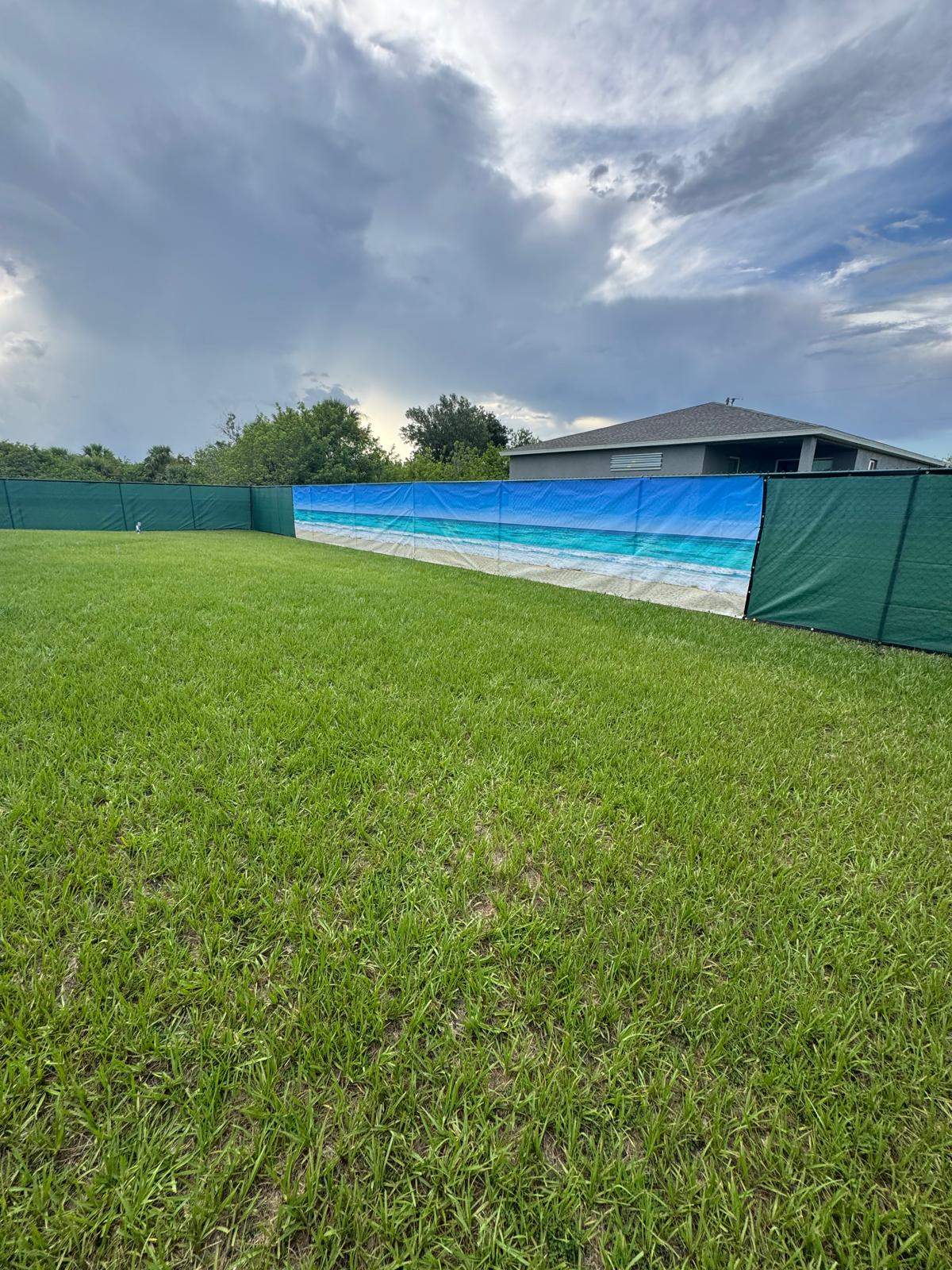 Chain Link Fence Installation with Custom Beach Privacy Screen in Port Charlotte by True Fence LLC