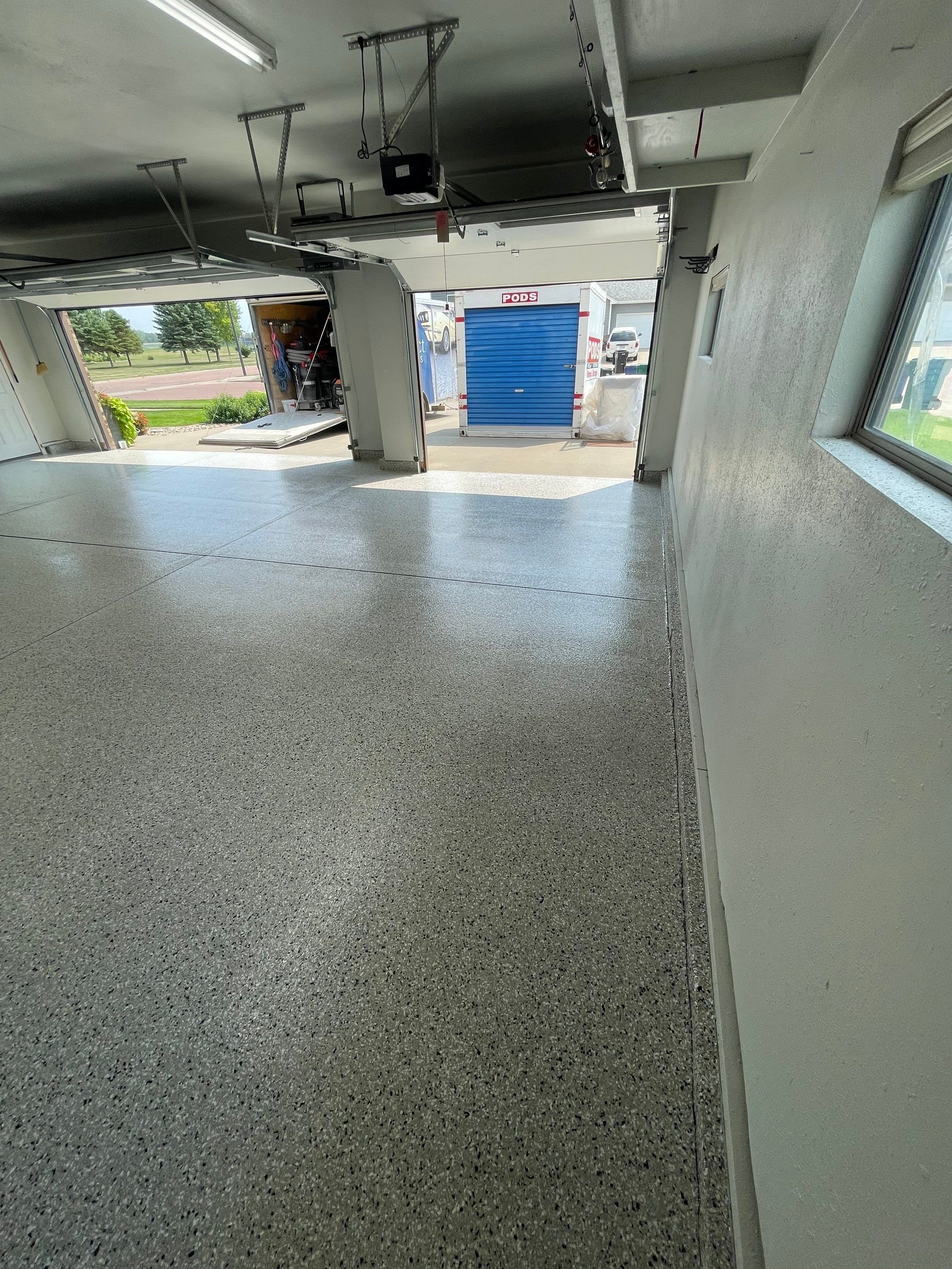 Multi-Car Garage Floor Coating and Crack Repair in Tea by Select Painting, Coatings & Garage Cabinets