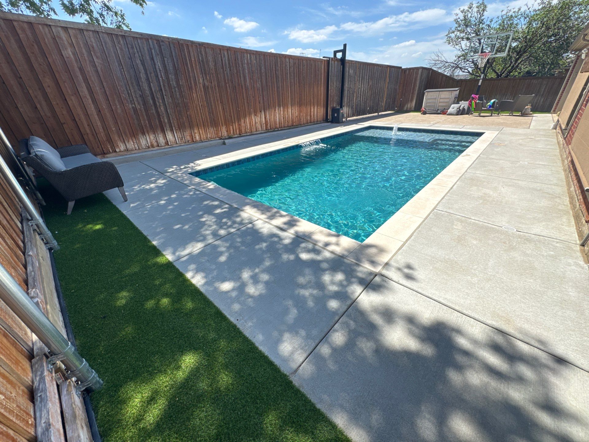 Modern Rectangular Plunge Pool with Turf by Pinnacle Pools and Spas - DFW