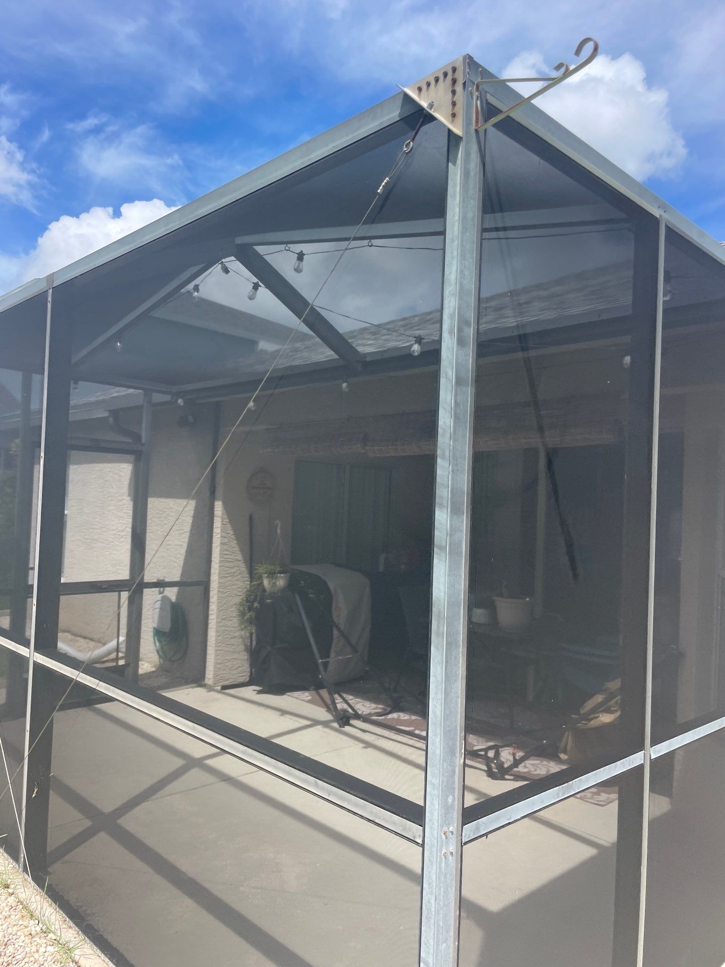 White Aluminum Seamless Gutters and Downspouts in Estero FL by Gutter Professors