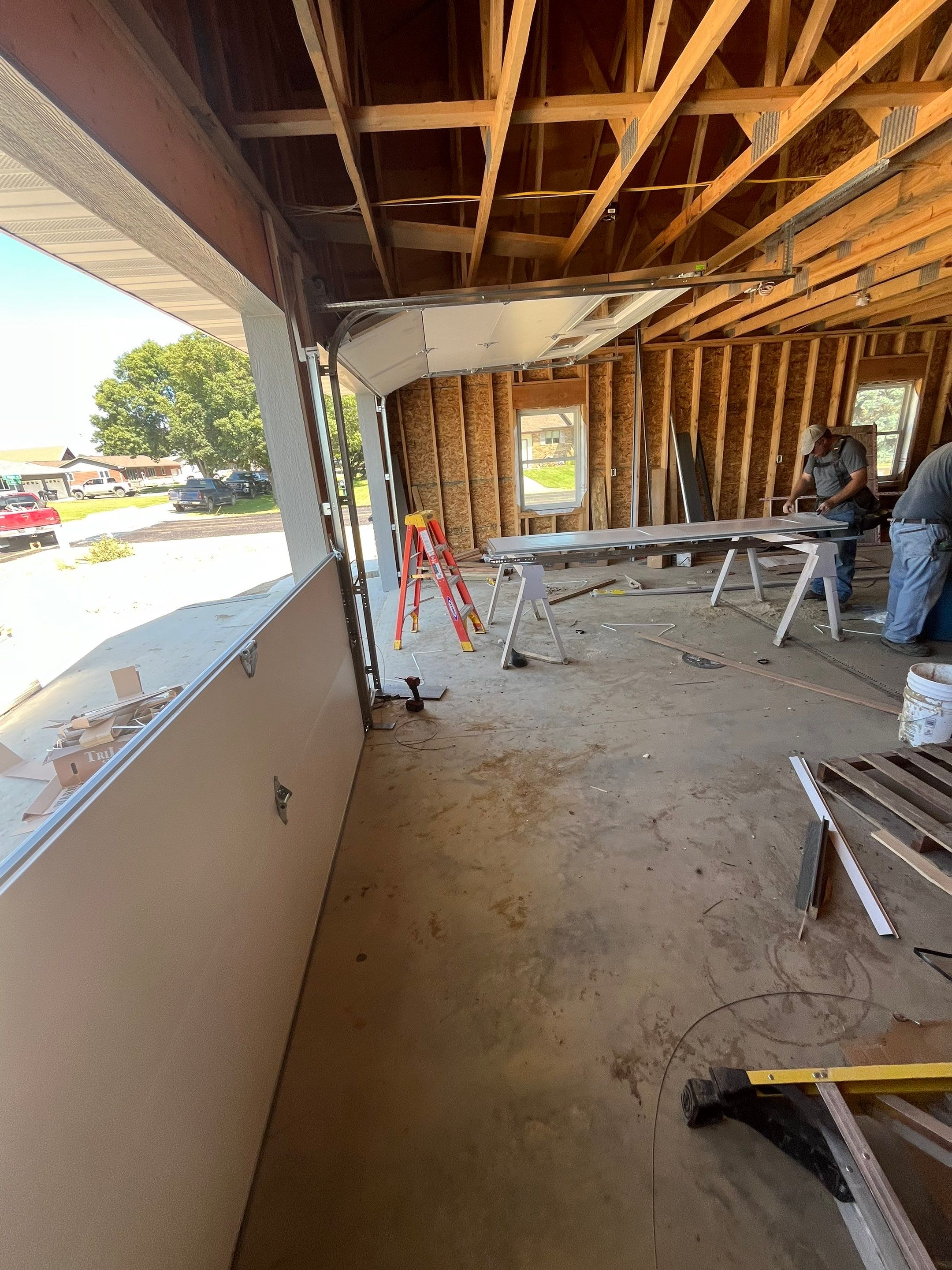 Custom Garage and Basement Epoxy Floor Coating in Menno by Select Painting, Coatings & Garage Cabinets