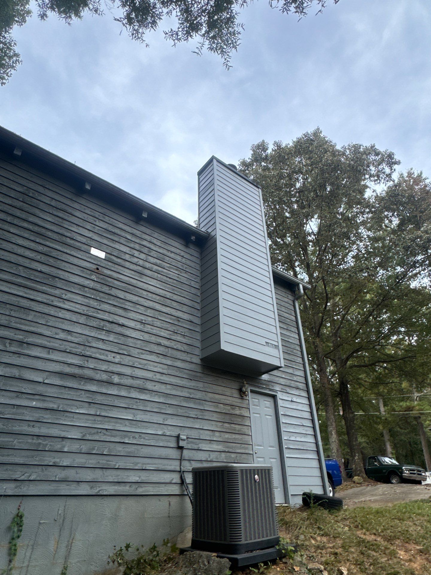 Chimney Chase Siding Replacement and Exterior Painting in Cartersville by Swift Home Renovations 