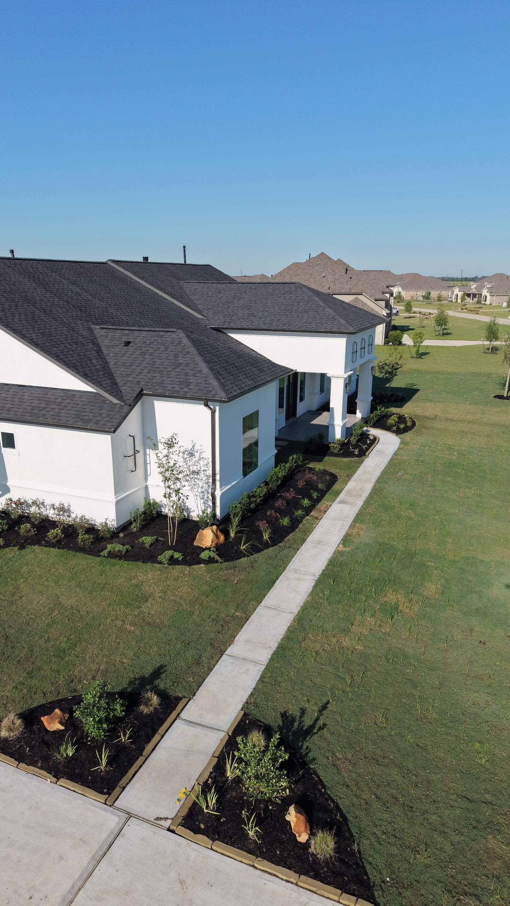 Custom Stucco Masterpiece with Precision Foam Detailing – Waller, TX by Apex Conventional Stucco Llc
