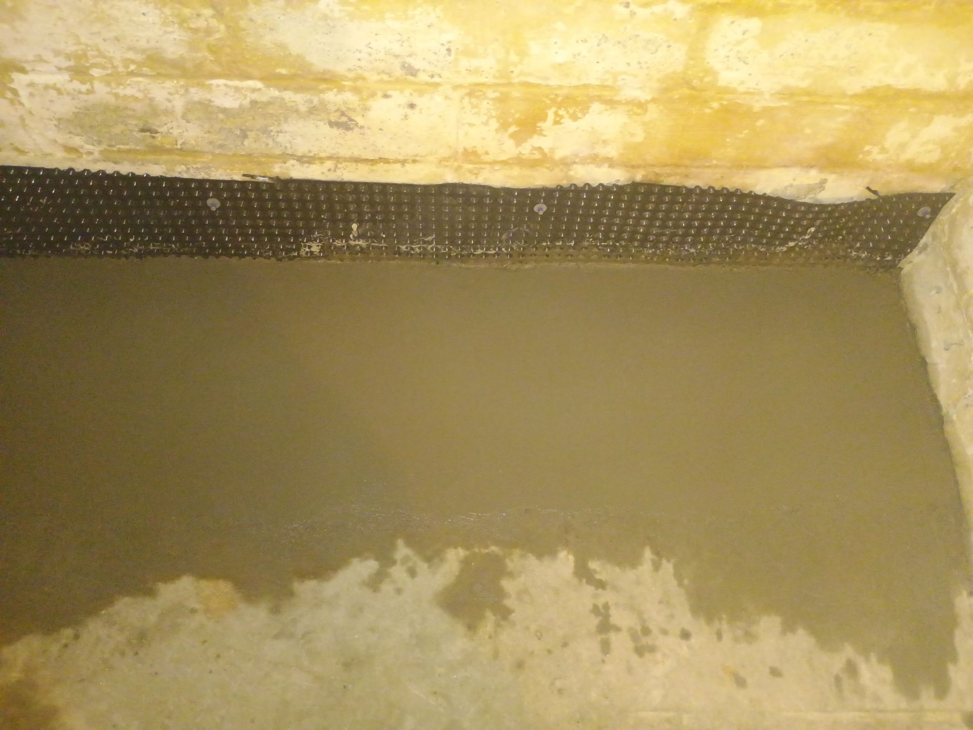 Interior Drain Tile for a South Minneapolis Basement by Waterproofing Northeast