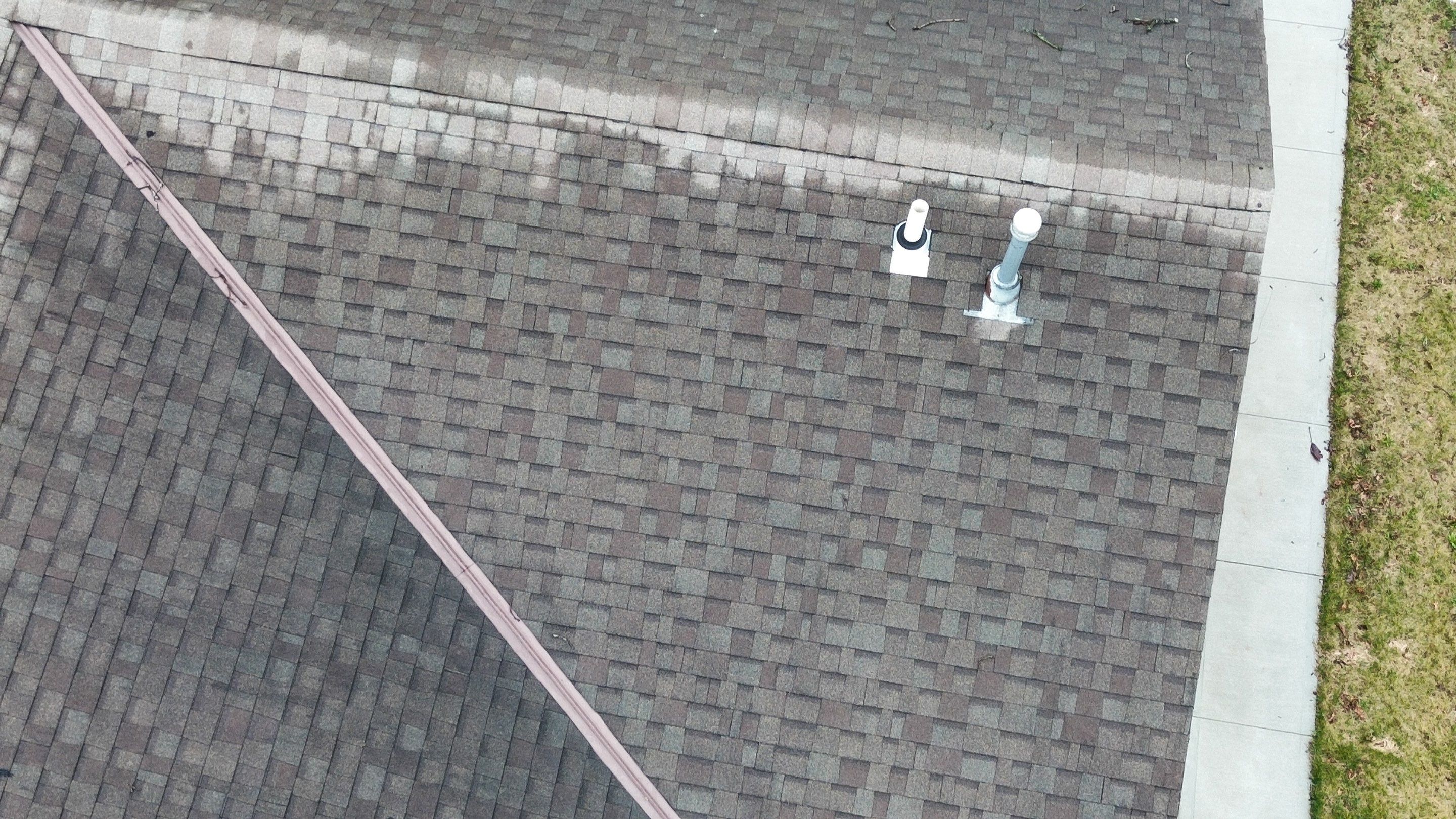 Residential Roofing Installation using Performance Panel Metal - Crinkle Bronze by RoofX 