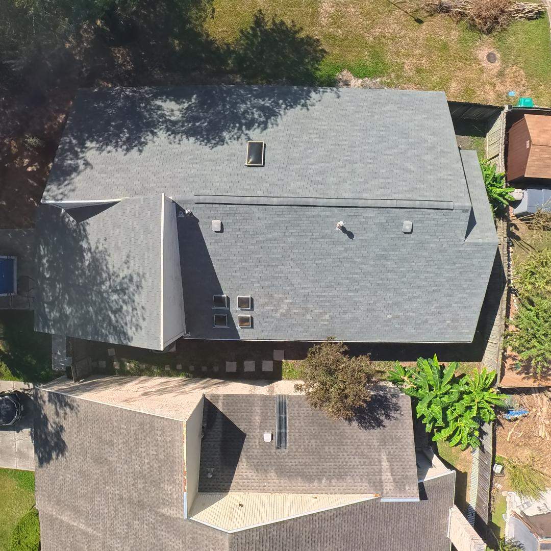 Asphalt Shingle Roof Repair and Skylight Sealing in Houston by One Legacy United