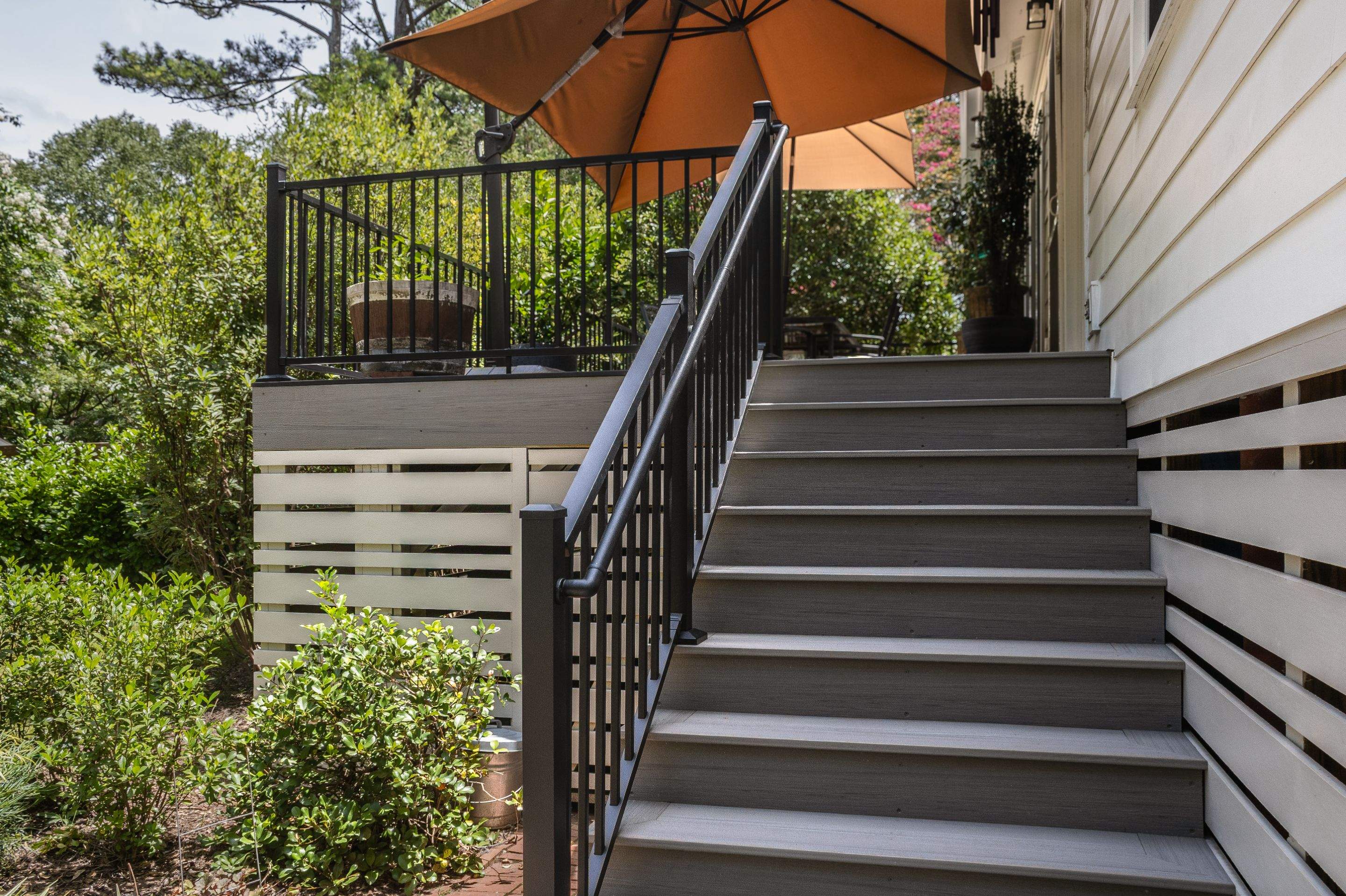 Atlanta, GA Deck Replacement and Hog Board Underpinning Install with Deckorators Summit Series Decking and Hardie Trim by Nelson Exteriors 