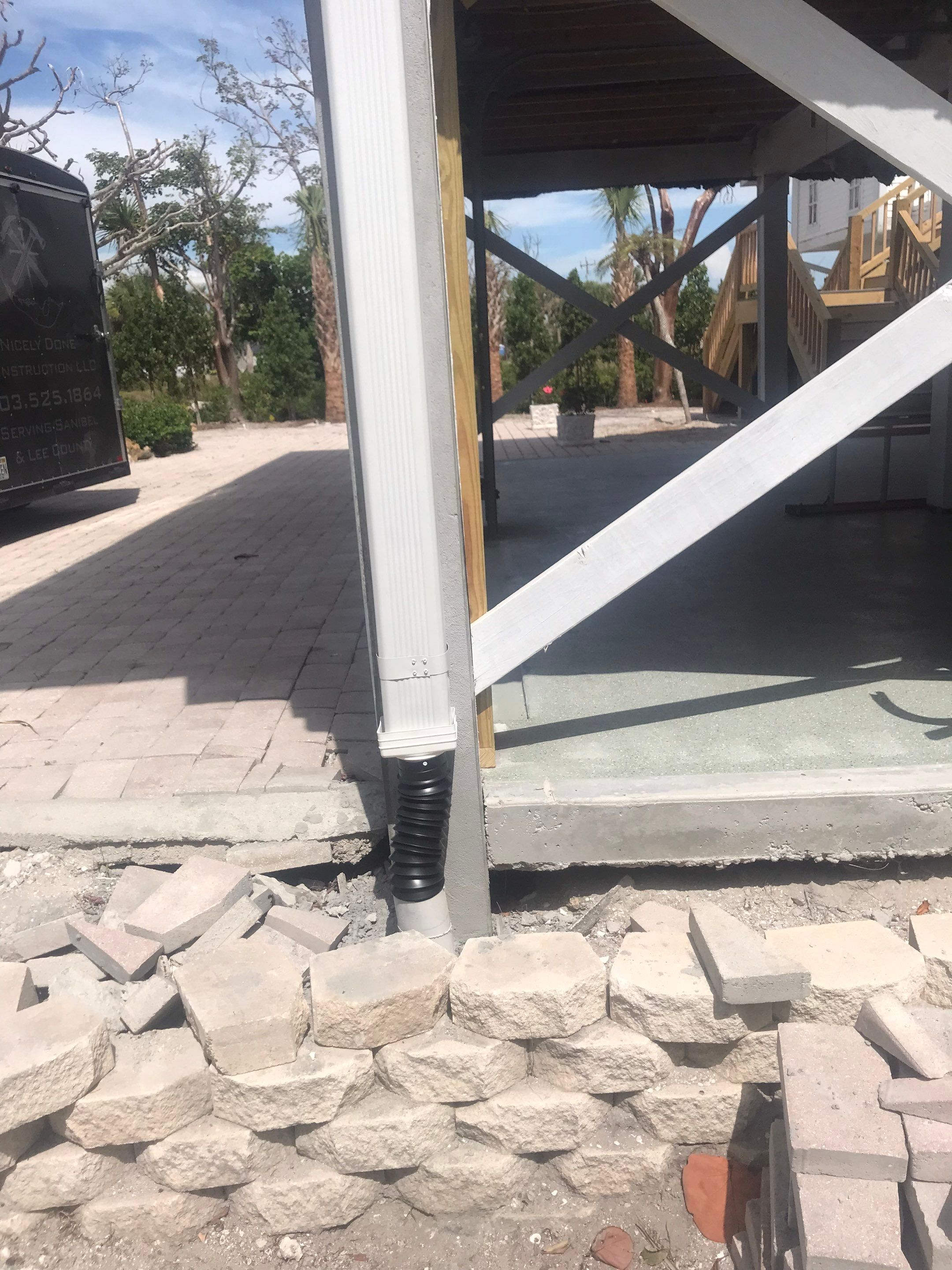 Downspout Installation using Downspout Extension in Sanibel FL by Gutter Professors