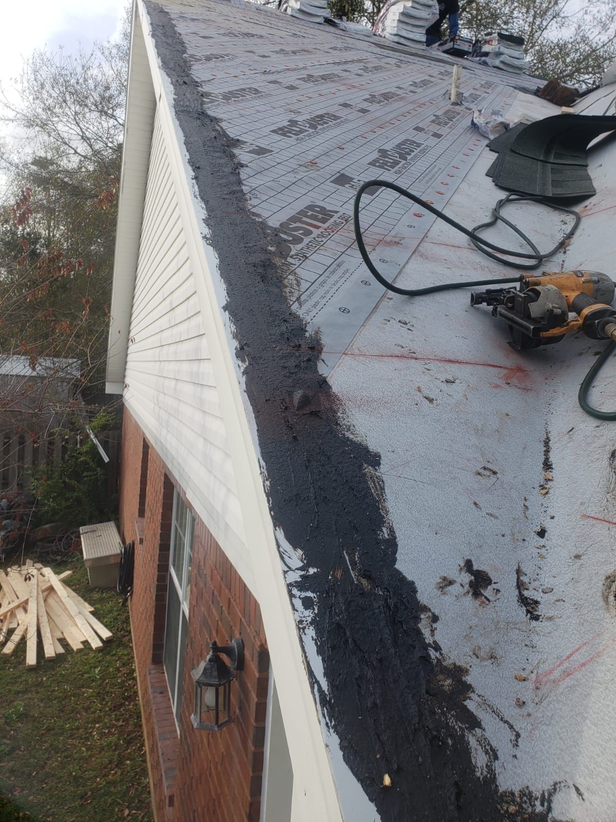 Residential Roofing Installation using Roof Replacement by American Roofing & Construction LLC