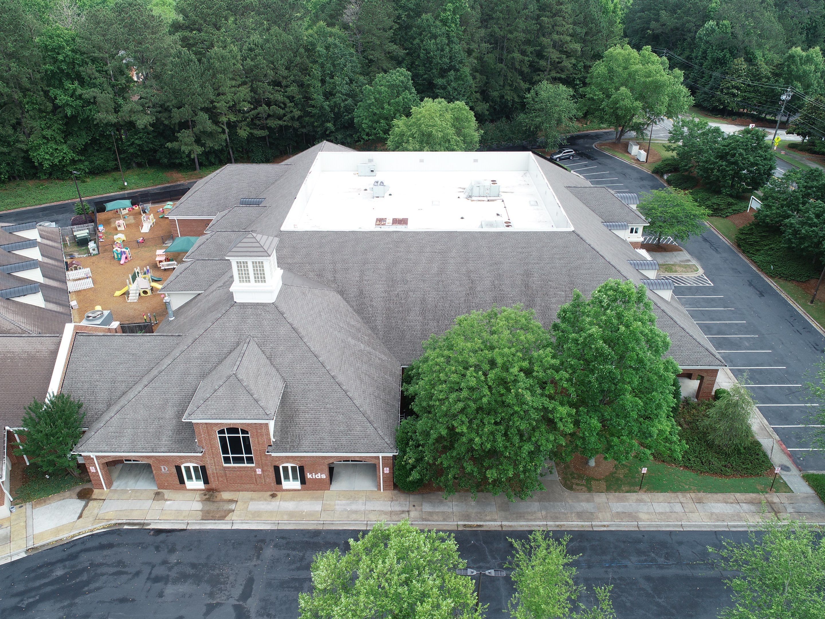 Baptist Church in Peachtree Corners Shingle Roof Replacement and Coating by Georgia Roof Advisors