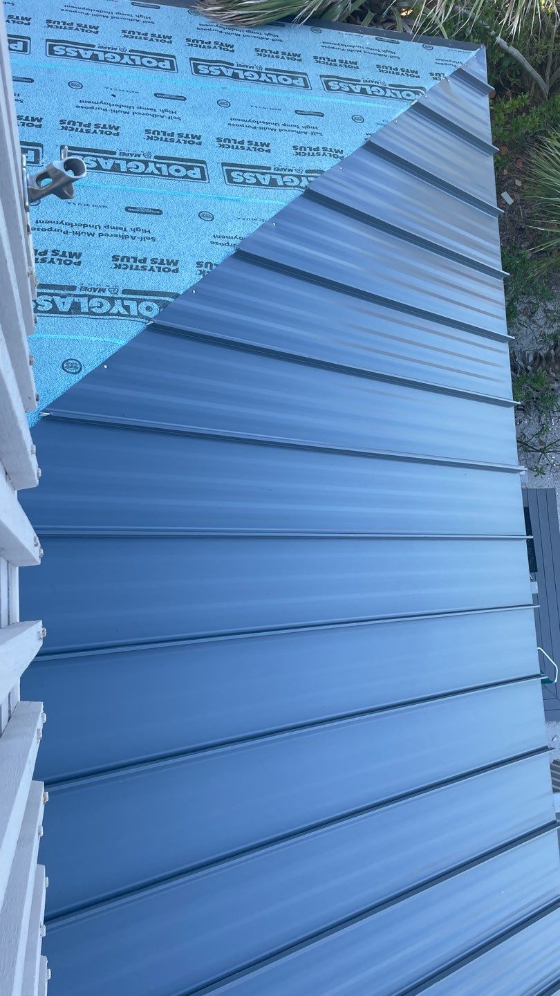 Residential Roofing Installation using Gulf Coast Metals Gulf Seam Panels by Four Peaks Roofing