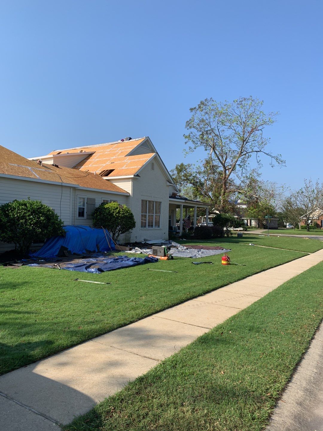 Residential Roofing Installation using Roof Replacement by American Roofing & Construction LLC