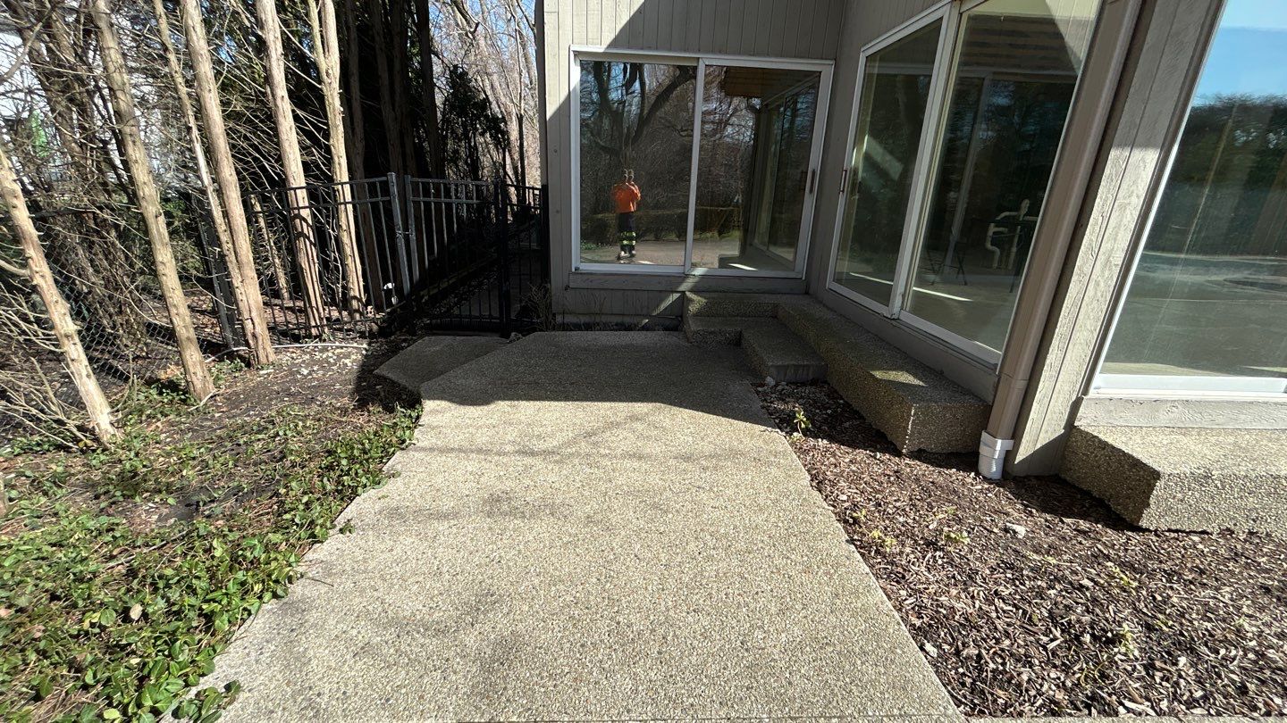 Aggregate Clean and seal using low gloss sealer by Northern Power Washing LLC.